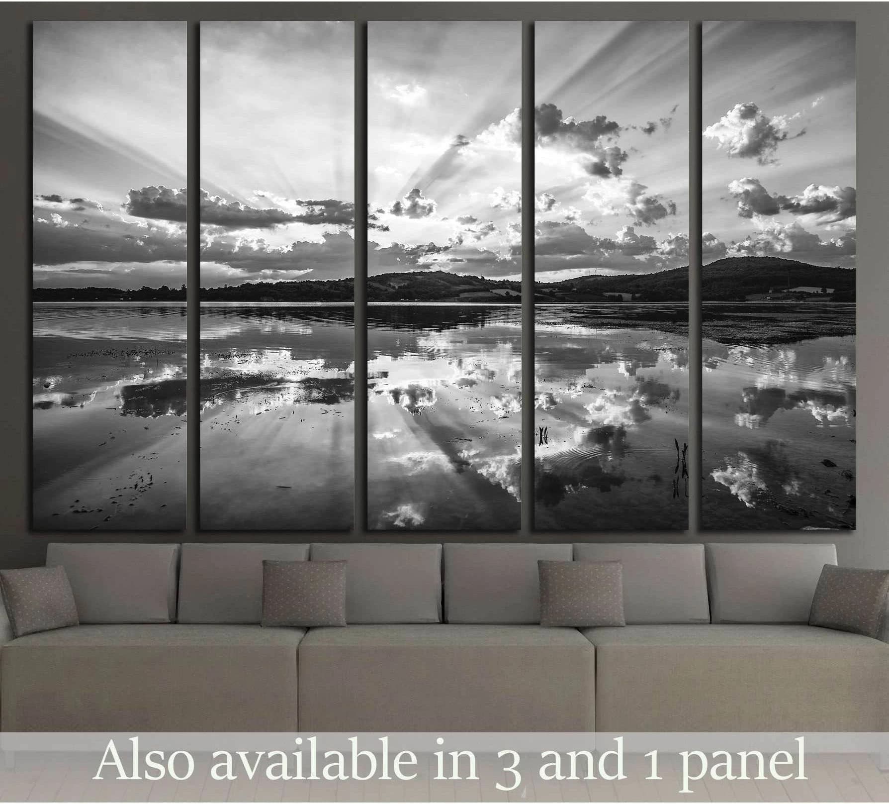 Black and white lake canvas print with sun rays, cloud reflections, and panoramic multi-panel layout