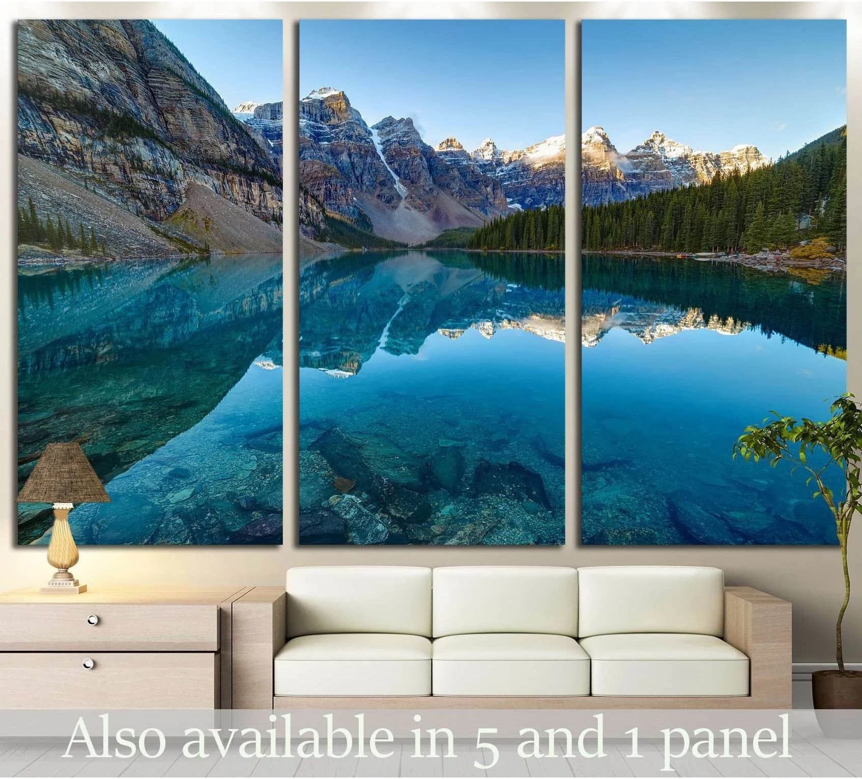 Moraine Lake panoramic canvas print with turquoise water and Rocky Mountain reflection above a sofa
