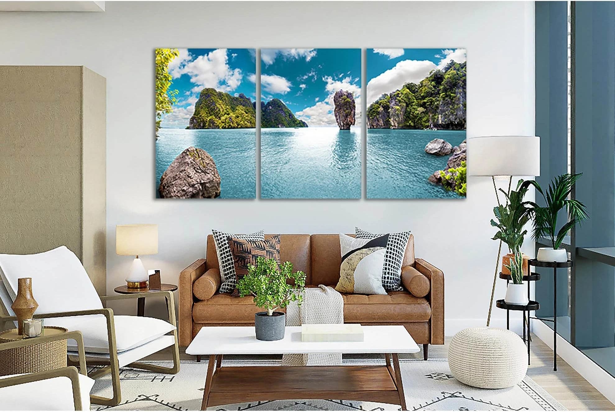 Turquoise ocean seascape with green islands, rocky cliffs and white clouds under a blue sky detail view