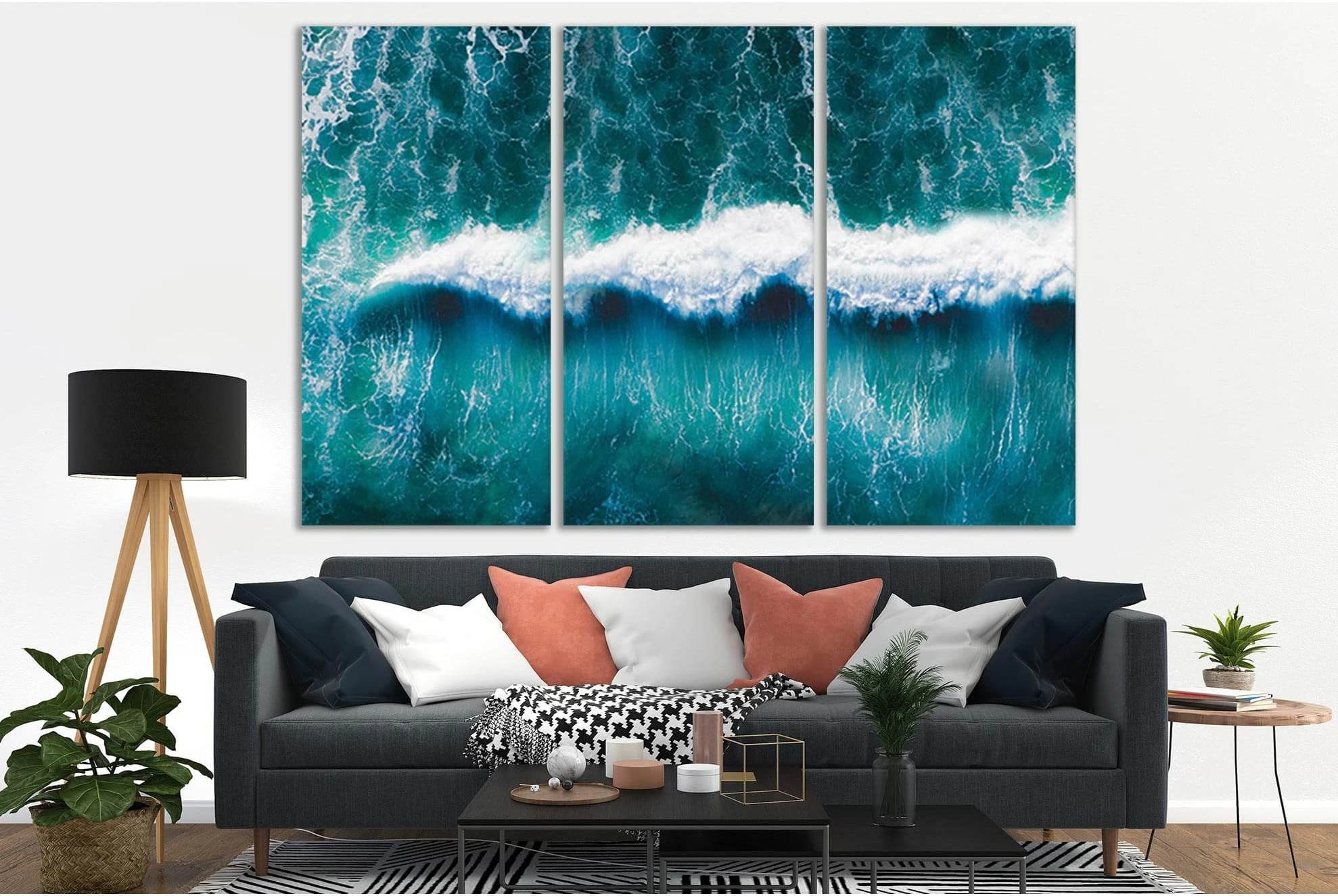 Teal ocean wave artwork with bright white foam breaking across the centre detail view