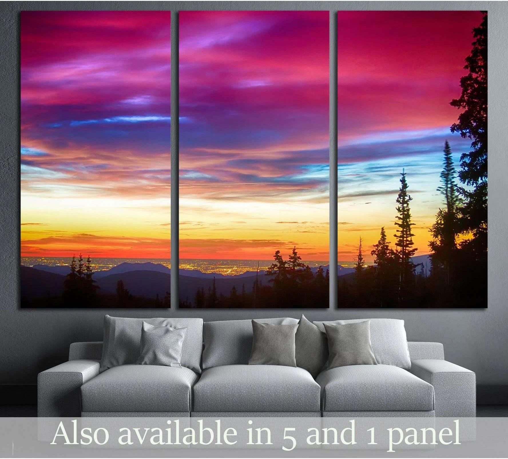 Boulder sunrise triptych canvas print with pink sky and city lights above a gray sofa