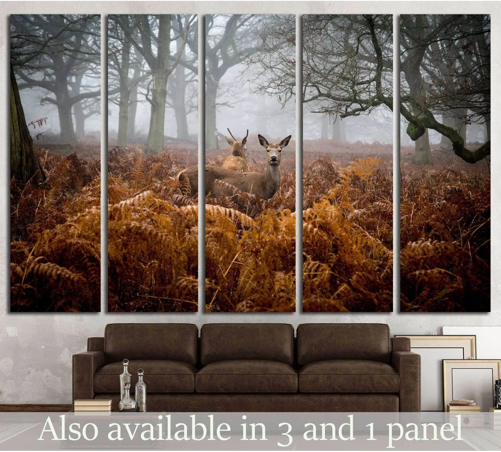 Richmond Park deer canvas print with two deer in foggy woodland, displayed above a brown sofa