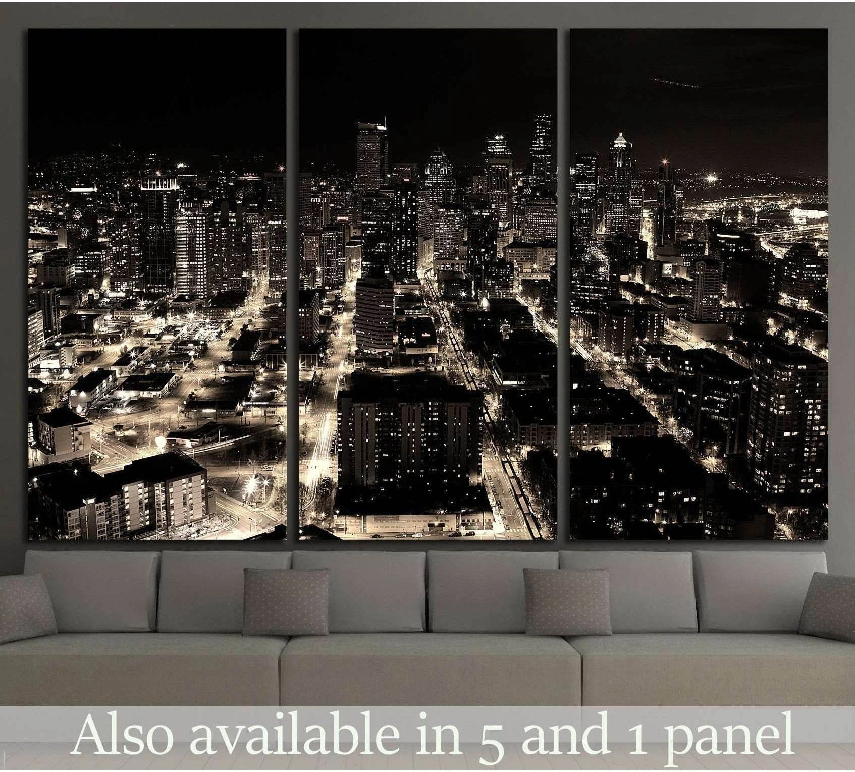 Seattle night skyline canvas print in monochrome tones above a sofa in a modern living room