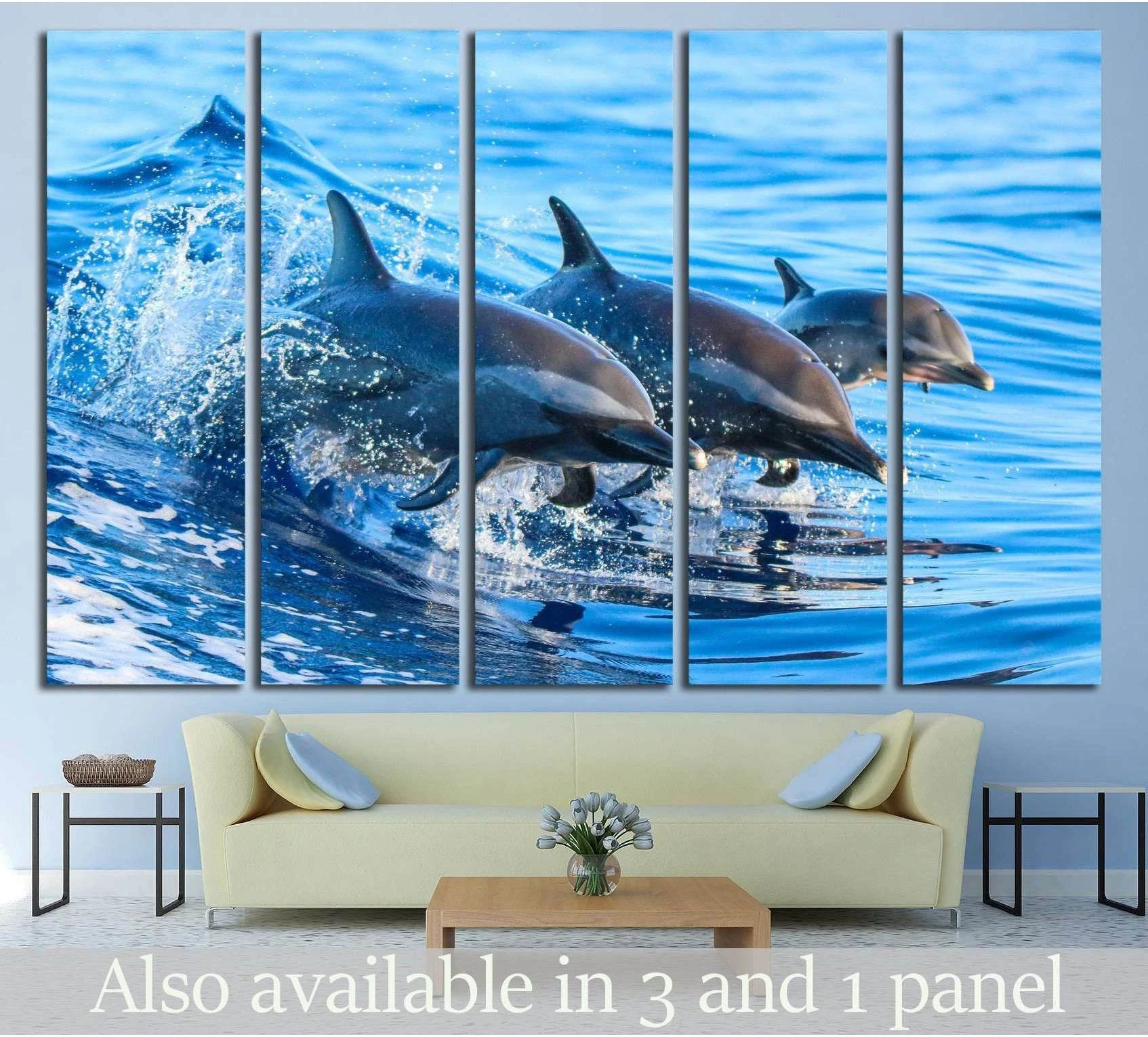 A spotted dolphin family leaping out of the clear blue Hawaii waters showing blue ocean wall art with water and coastal depth.