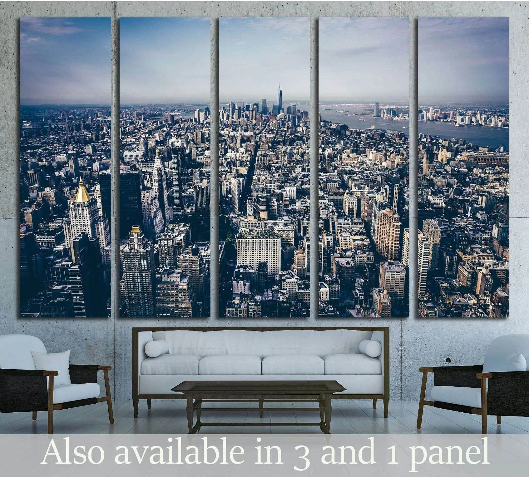 Five-panel NYC skyline canvas print with aerial Manhattan view above sofa in modern living room