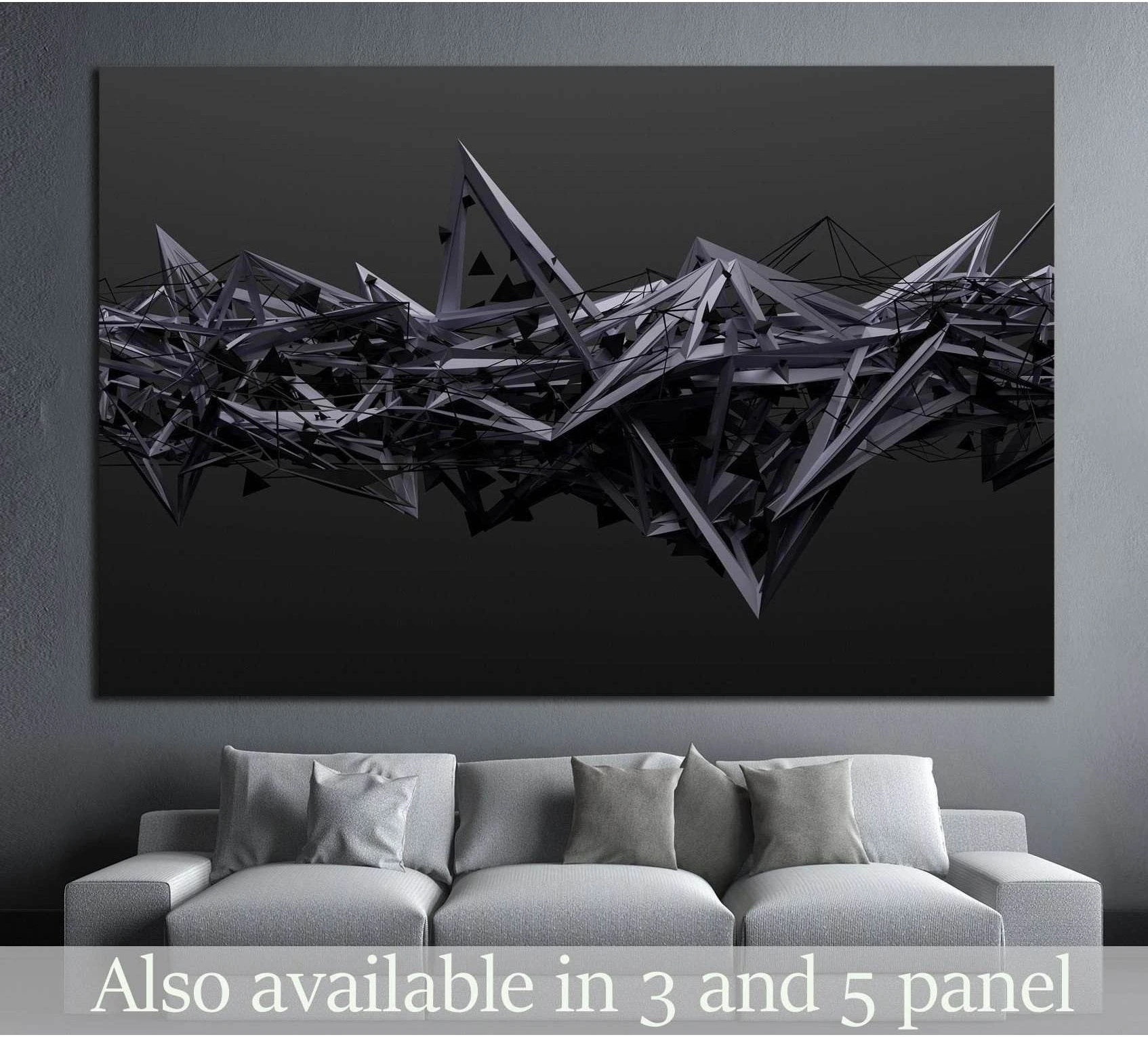 Black 3D geometric abstract canvas print above sofa in a modern dark living room