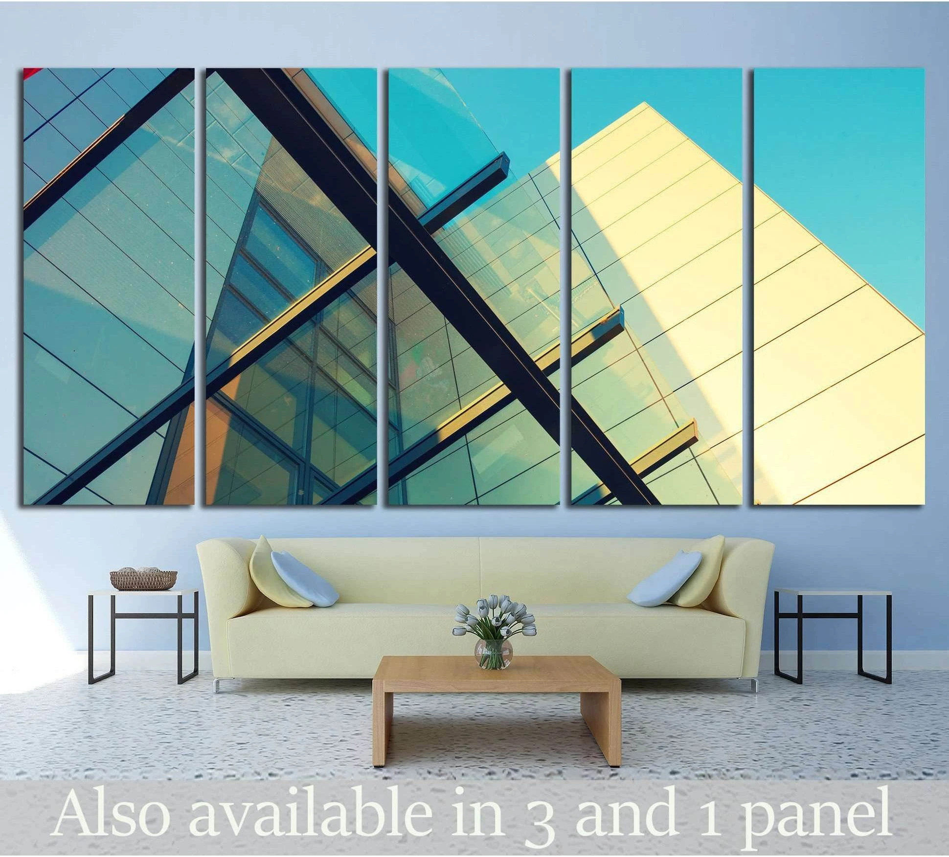 Abstract architecture multi-panel canvas print with teal glass facade above sofa in modern living room
