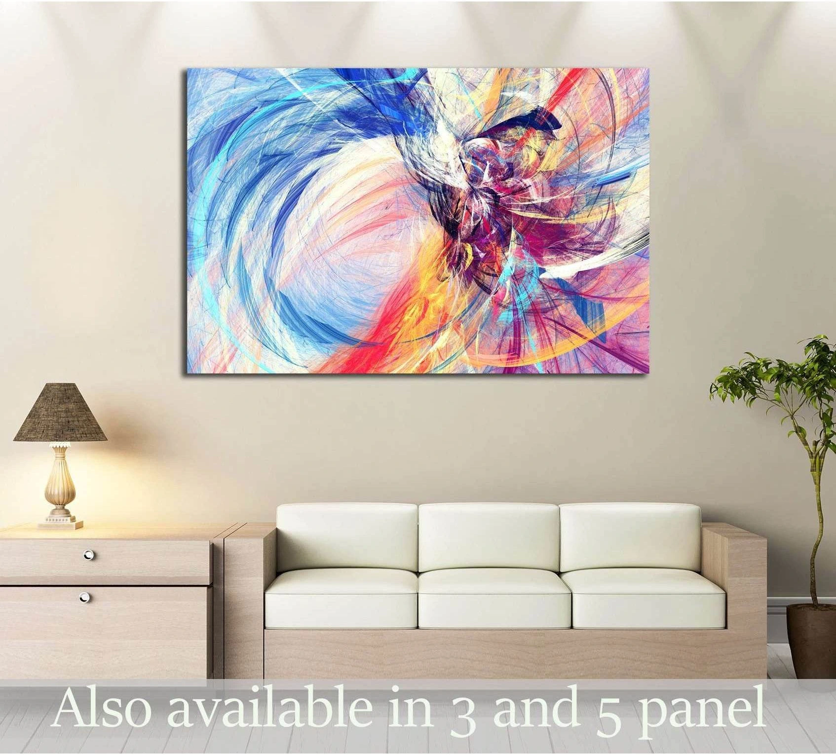 Colorful abstract canvas print with swirling blue, pink, yellow, and purple motion above a sofa