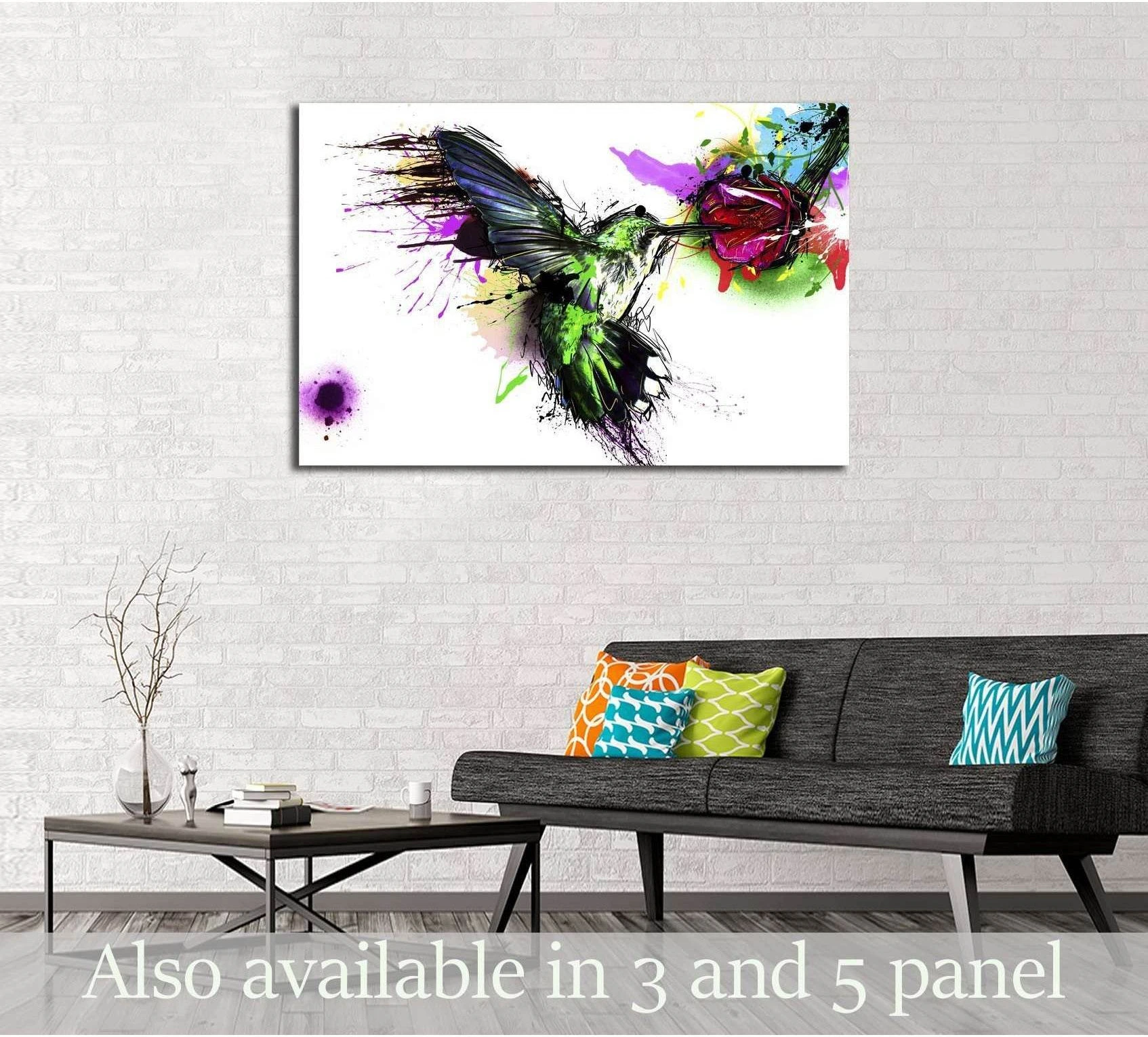 Abstract hummingbird canvas print with colorful paint splashes above sofa in modern living room