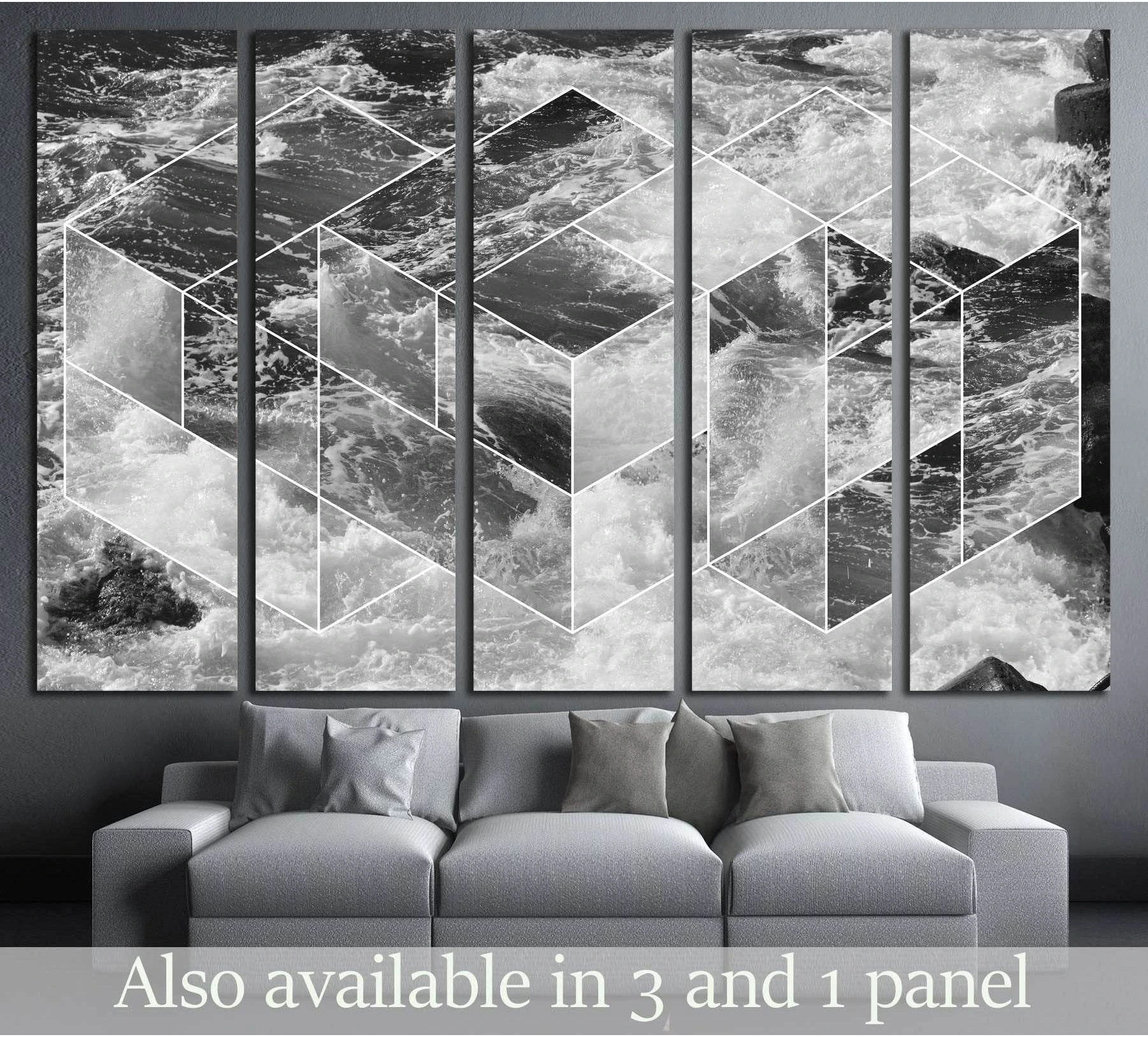 Black and white ocean waves canvas print with geometric lines above sofa in modern living room