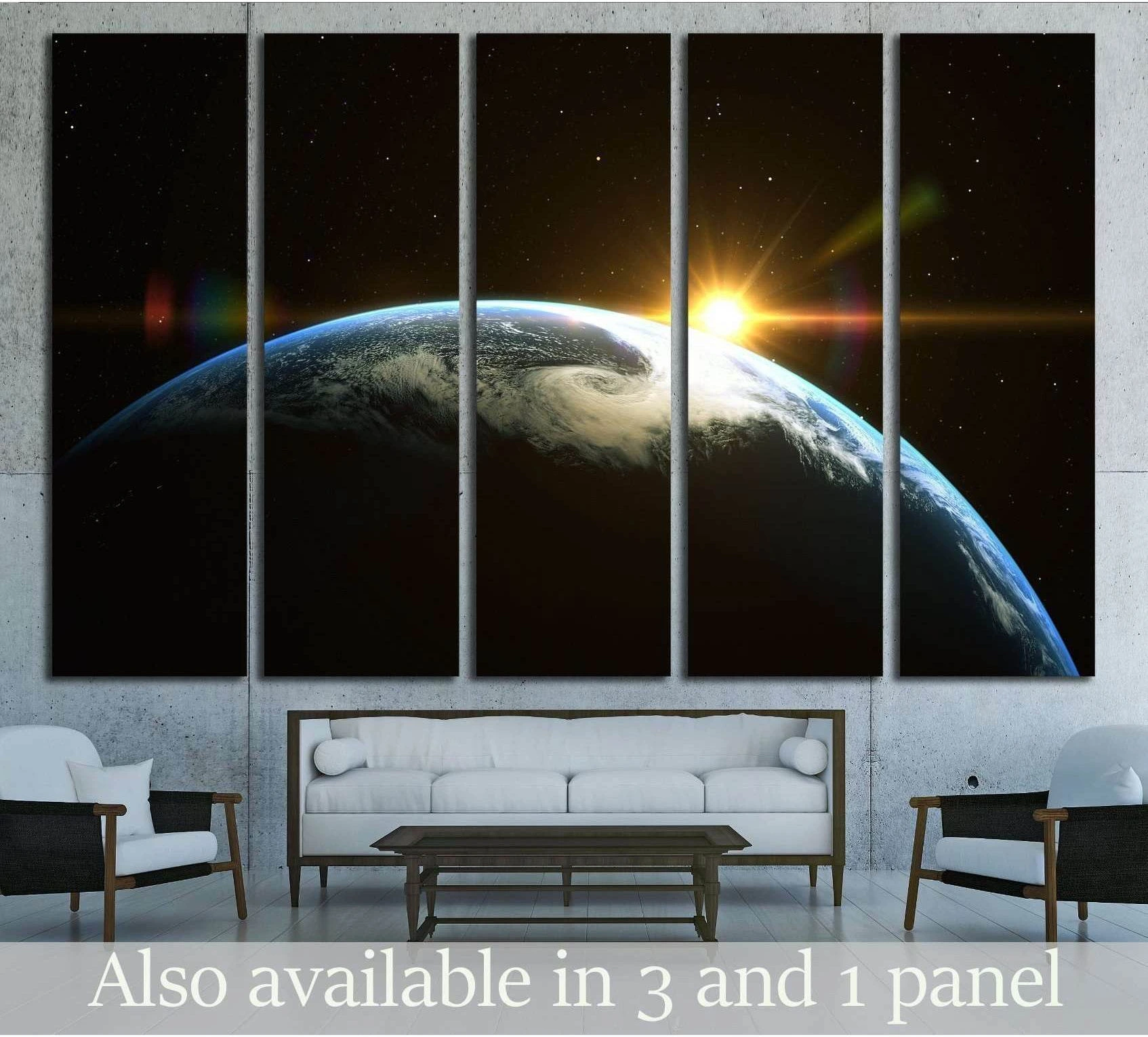 Earth sunrise canvas print above sofa in modern living room with planet horizon and sun flare