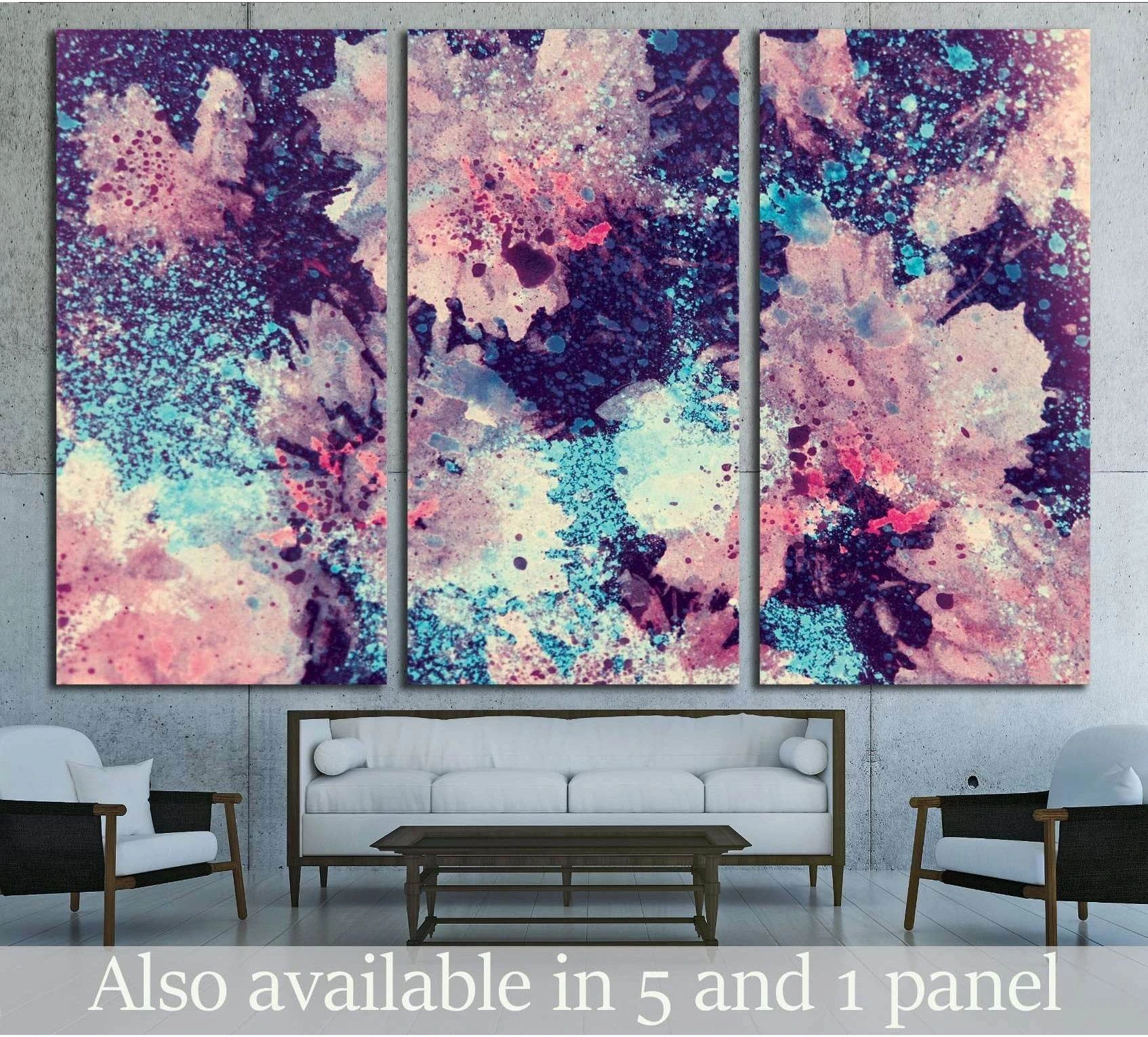 Abstract watercolor flower triptych canvas print with pink, plum, and aqua splatter blooms above a sofa