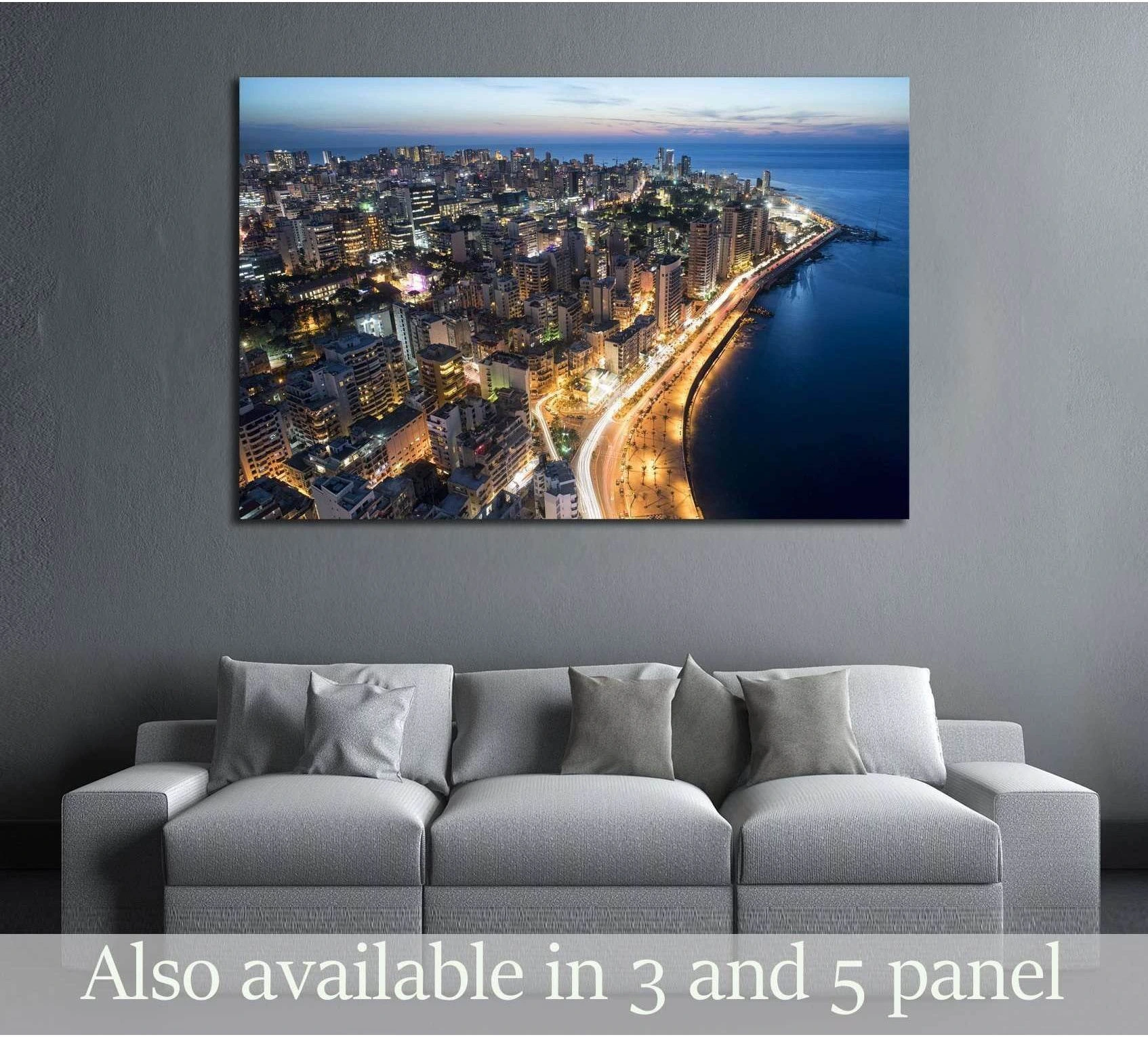 Aerial Beirut coastline at night canvas print hung above a sofa in a modern living room