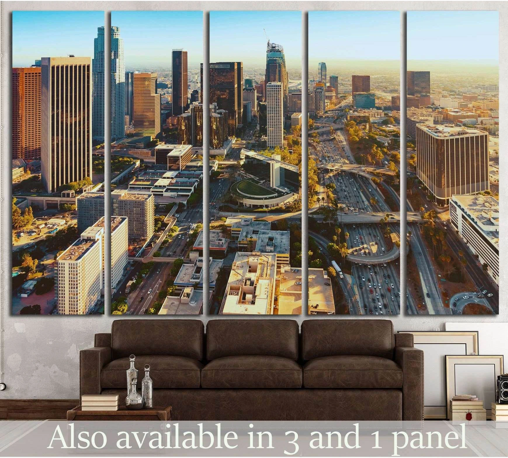 Aerial Downtown Los Angeles skyline canvas print at sunset displayed above sofa in modern living room