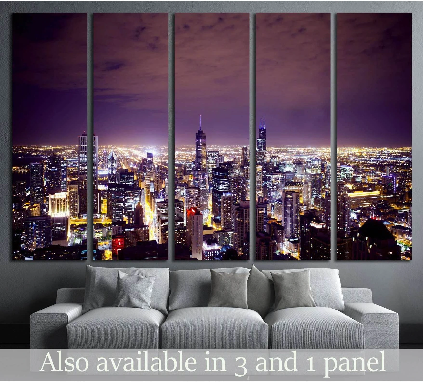 Chicago skyline canvas print above sofa with glowing night city lights and purple sky in a modern living room