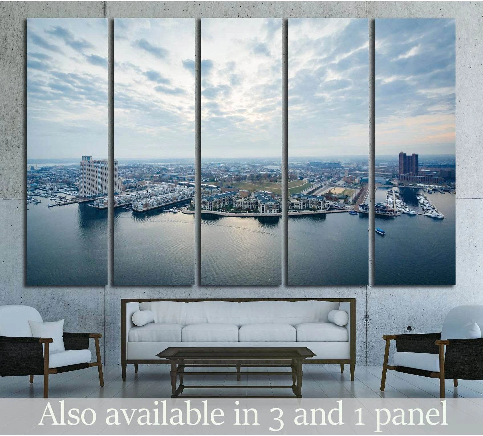 Baltimore Inner Harbor aerial canvas print in a multi-panel living room mockup above a white sofa