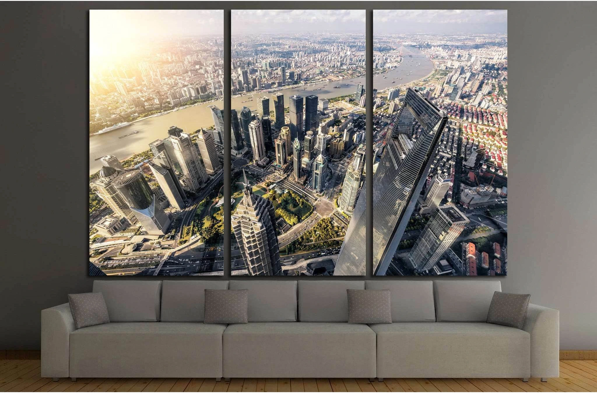 Aerial Shanghai Lujiazui skyline triptych canvas print above sofa in a modern living room