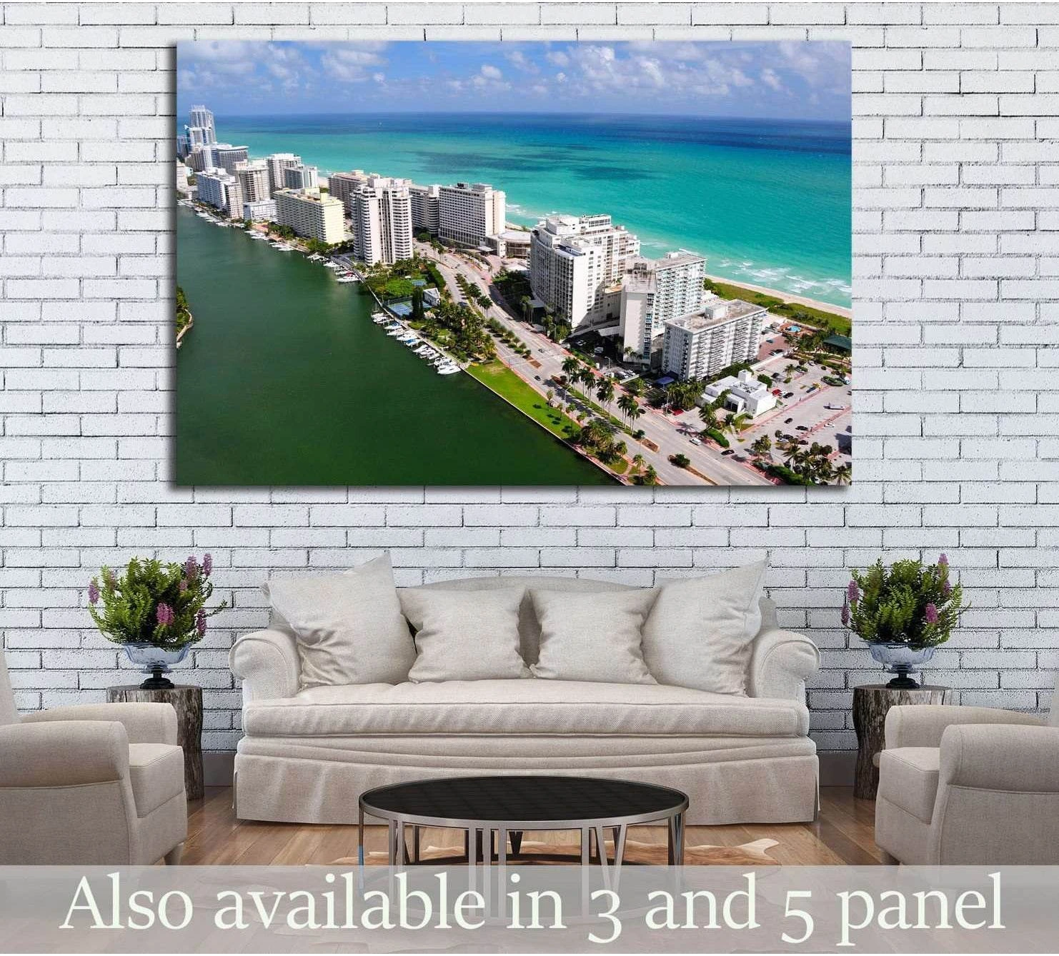 Aerial view of Miami South Beach canvas print above sofa with turquoise ocean and beachfront hotels