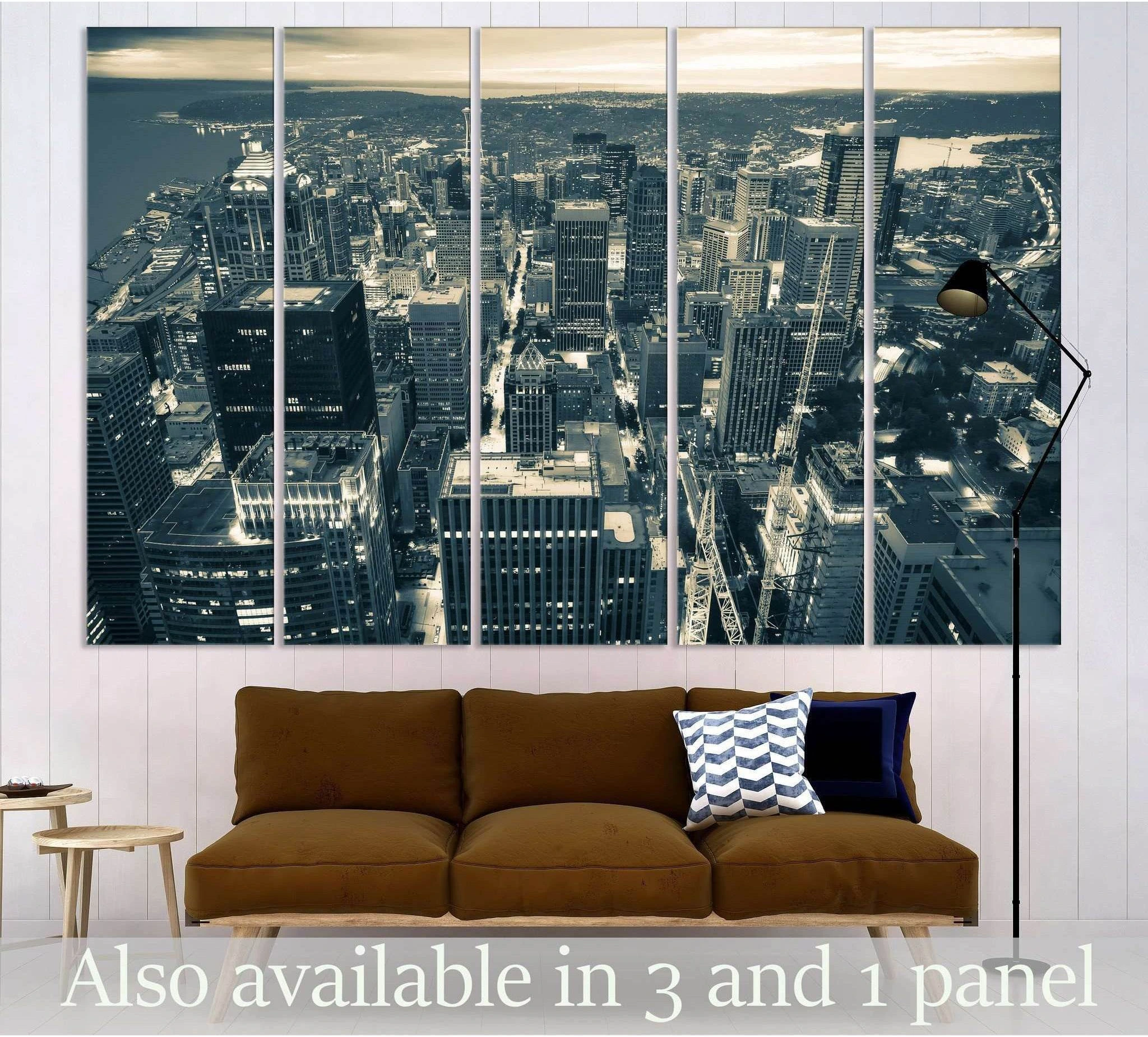 Seattle aerial skyline canvas print in black and white, shown as a five-panel cityscape above a sofa