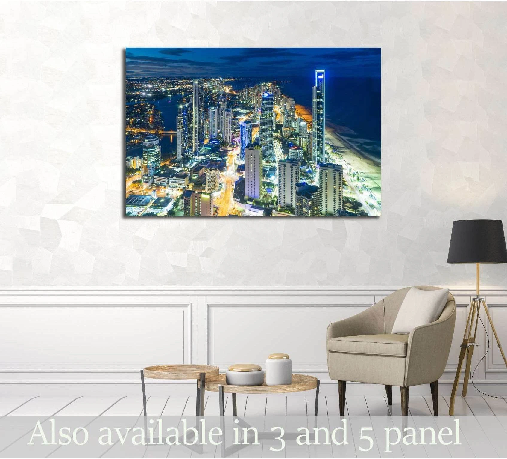 Gold Coast skyline canvas print above chair in modern room with coastal night lights