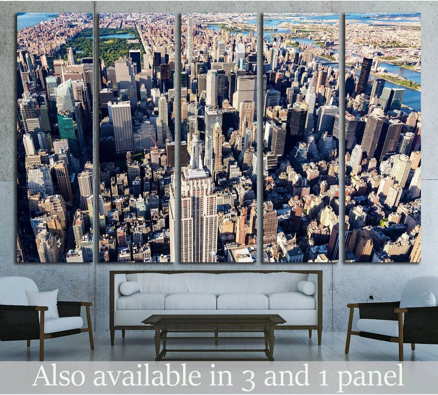 Aerial Midtown Manhattan skyscraper canvas print hung above a sofa in a modern living room