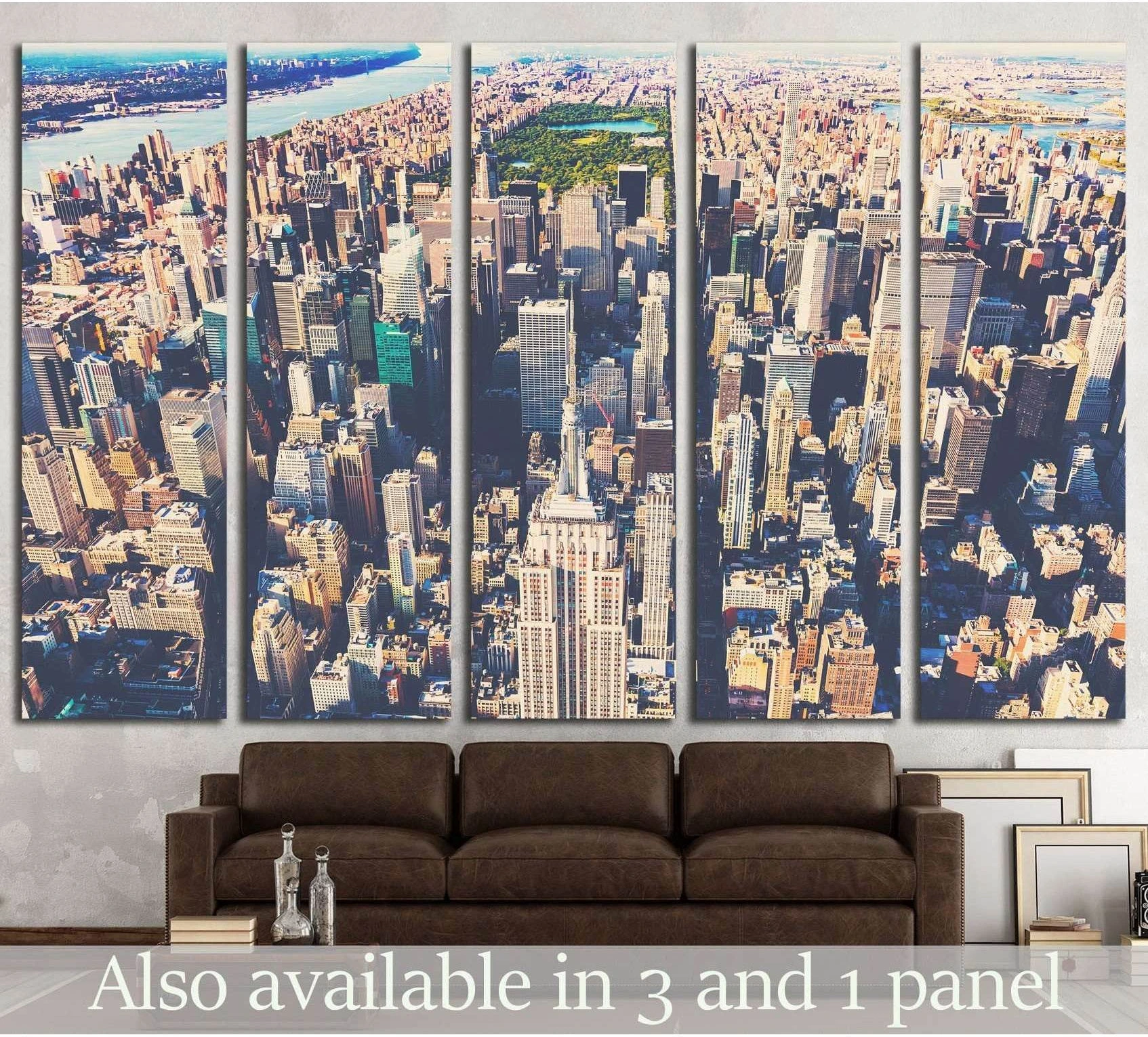 Aerial Midtown Manhattan canvas print with NYC skyscrapers above a sofa in a modern living room