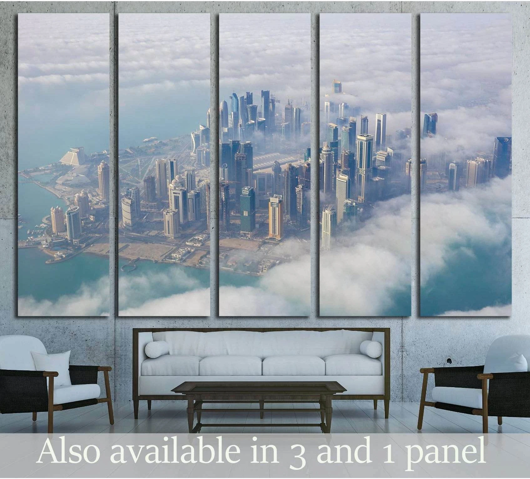 Aerial Doha skyline canvas print above sofa in a modern living room with clouds and blue water