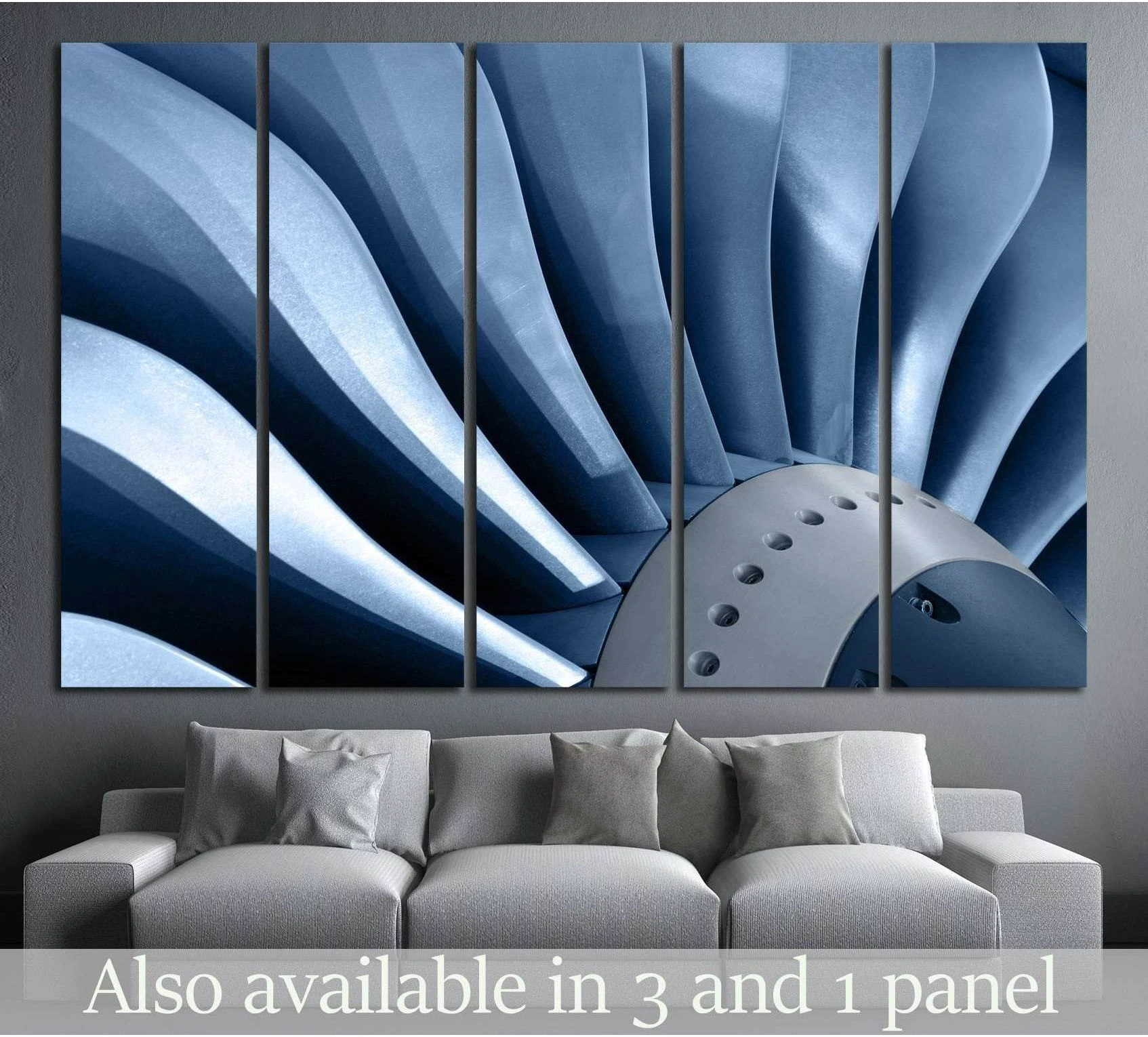 Blue air turbine canvas print with curved metal blades and riveted hub above a gray sofa