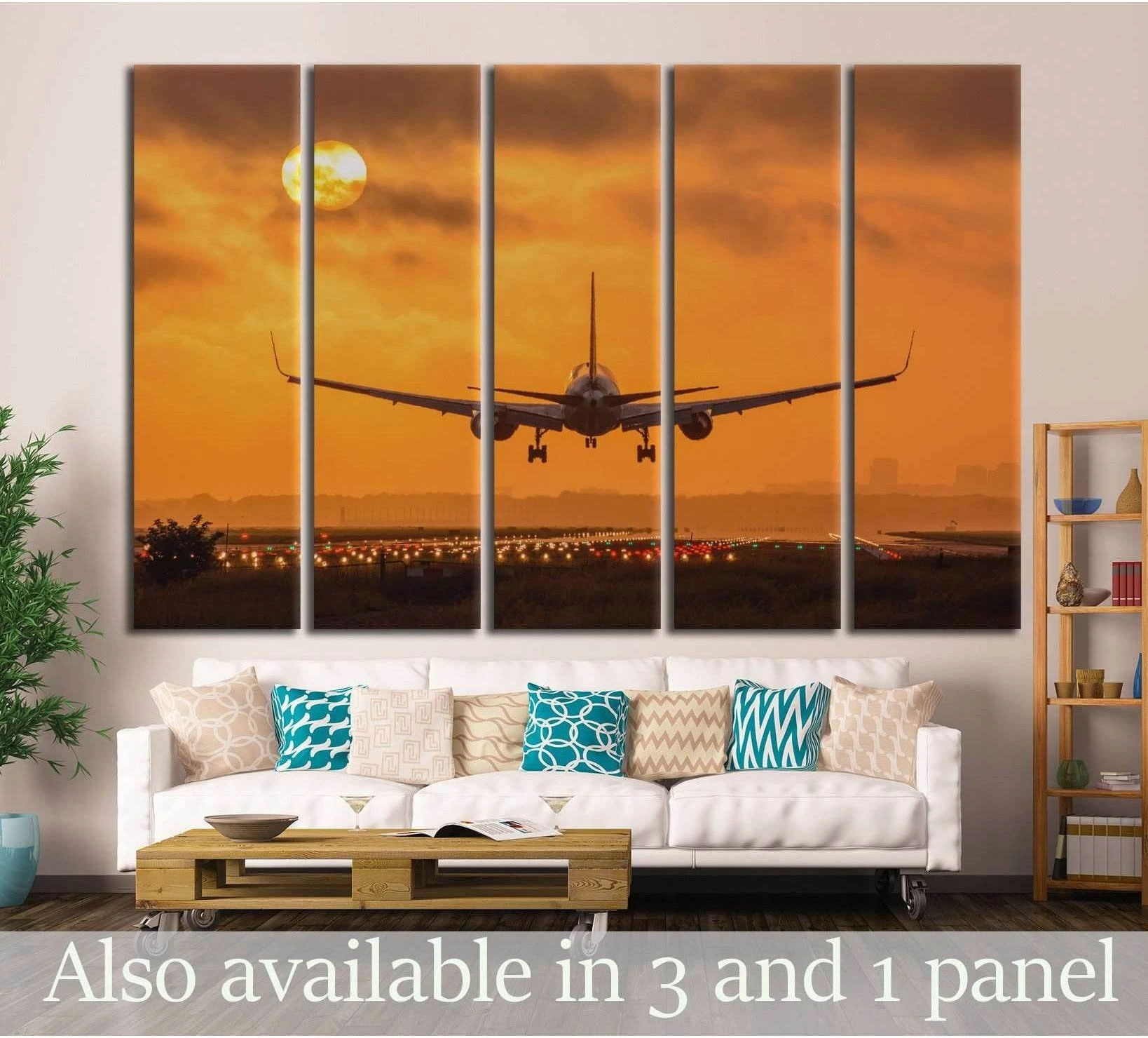 Airplane sunset canvas print in five panels with a runway landing scene and orange sky above a sofa