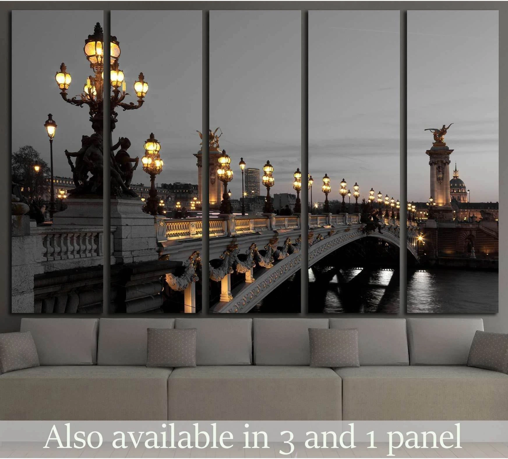 Pont Alexandre III Paris canvas print with glowing golden lamps above a sofa in a modern living room