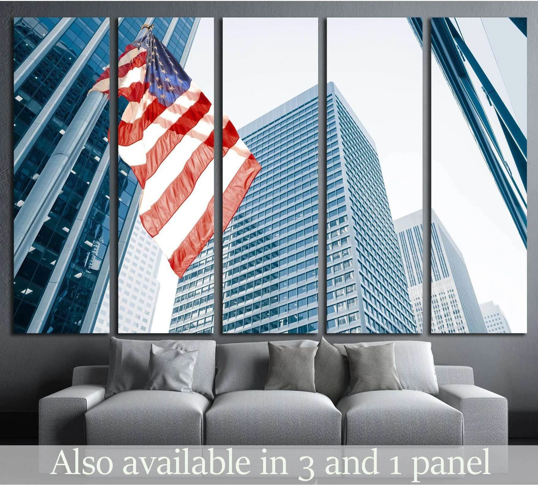 American flag canvas print between blue glass skyscrapers above sofa in modern living room