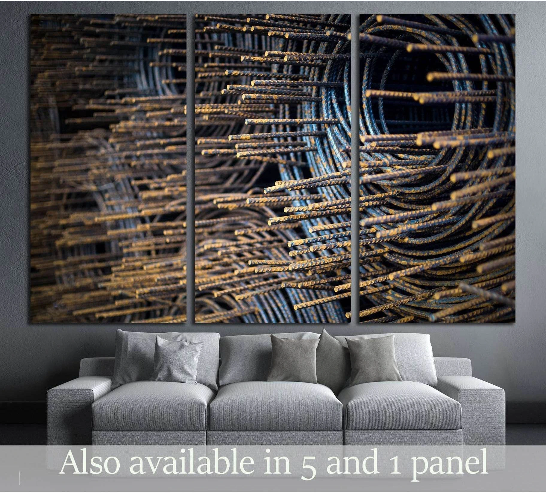 Rusted steel rebar canvas print in a triptych layout above a sofa with dark industrial metal texture