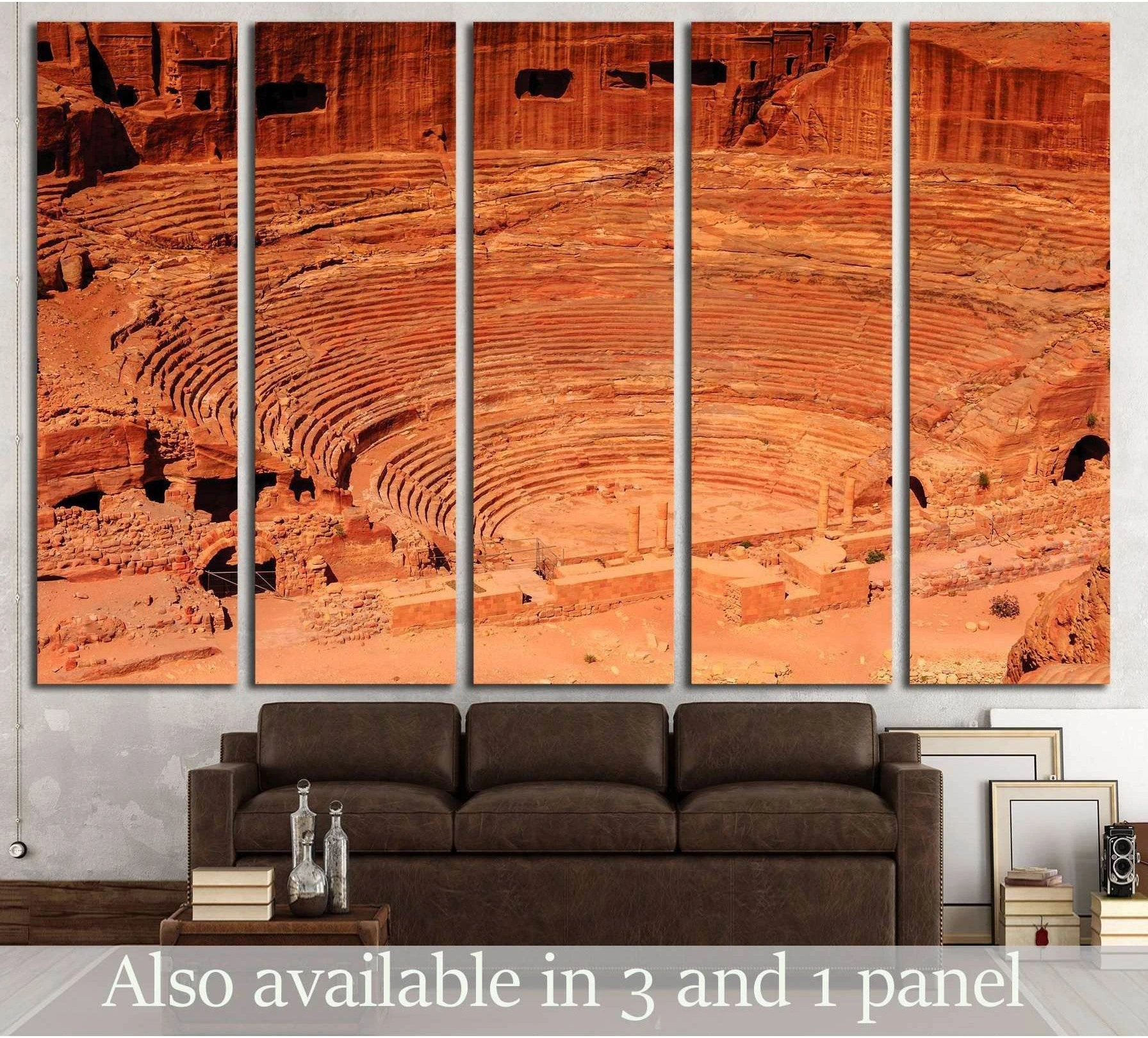 Ancient theater in Petra Jordan canvas print in warm sandstone tones above a brown sofa