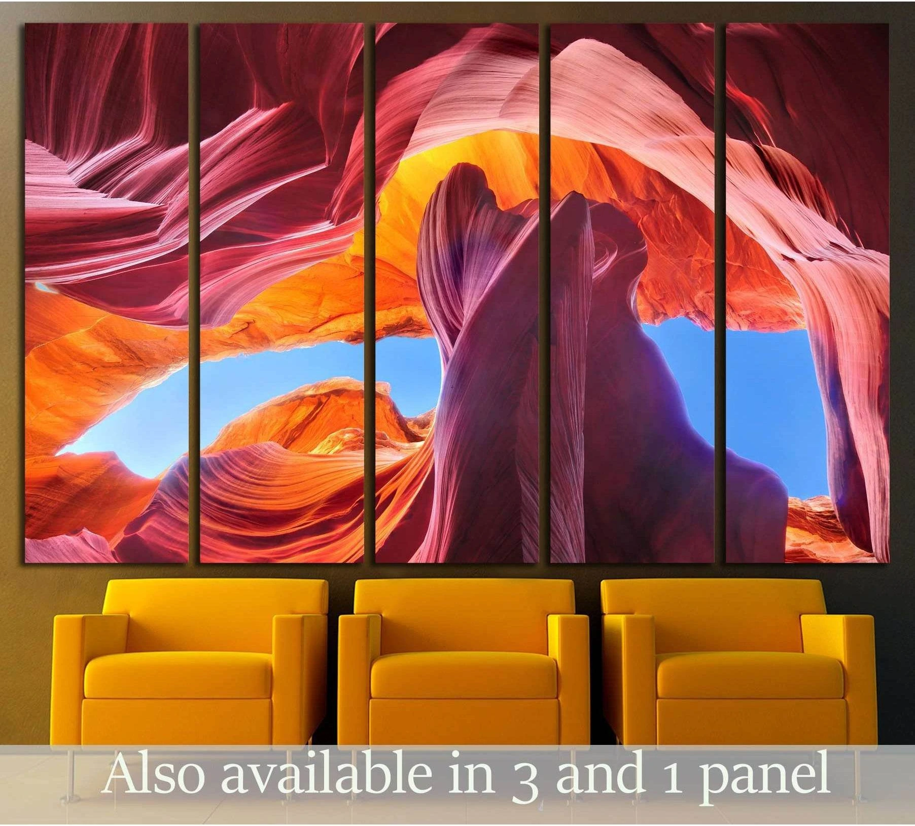 Antelope Canyon canvas print with glowing red-orange sandstone walls and blue sky opening above yellow chairs