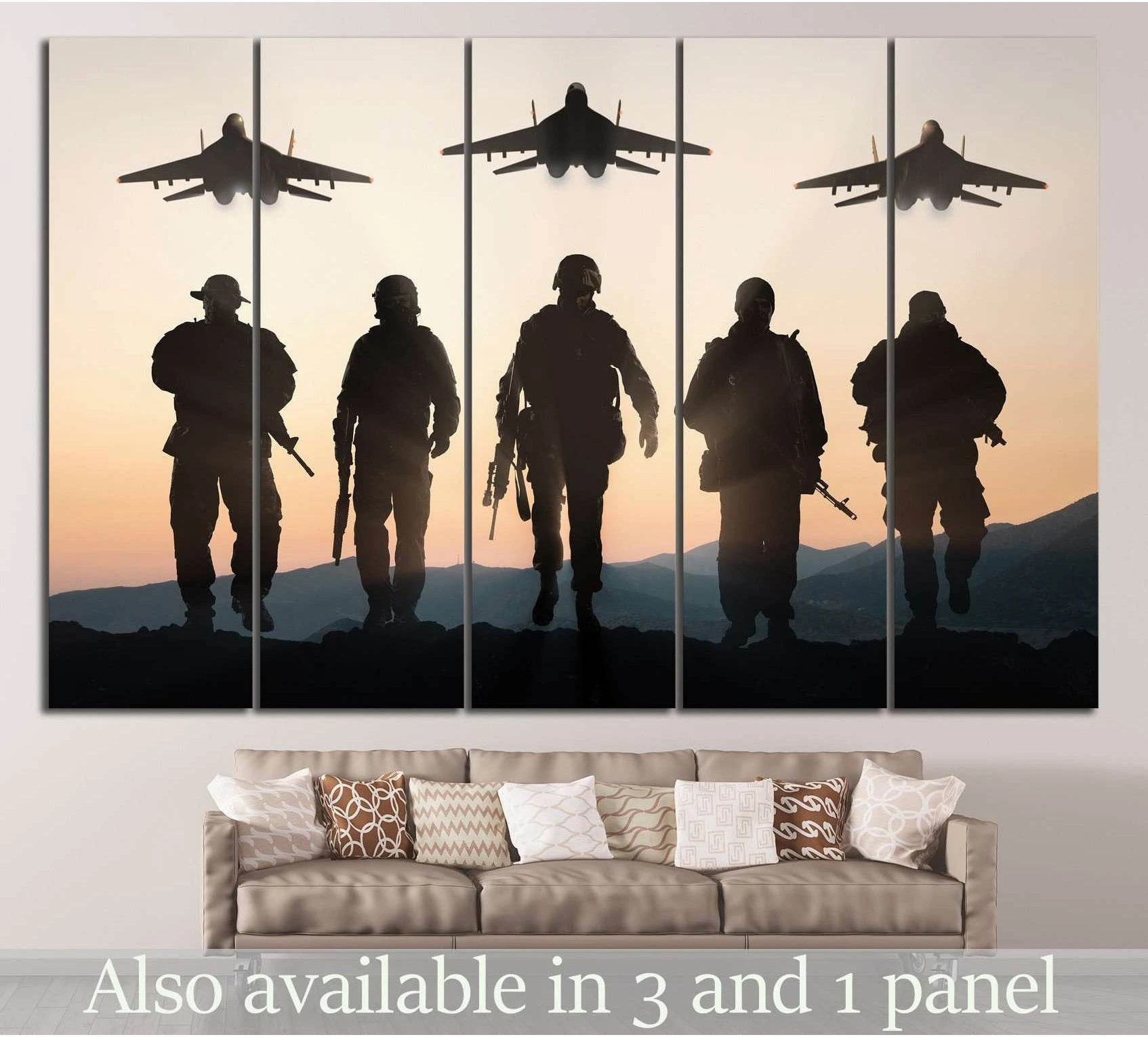 Army soldiers silhouette canvas print with fighter jets at sunset displayed above a sofa in a neutral living room