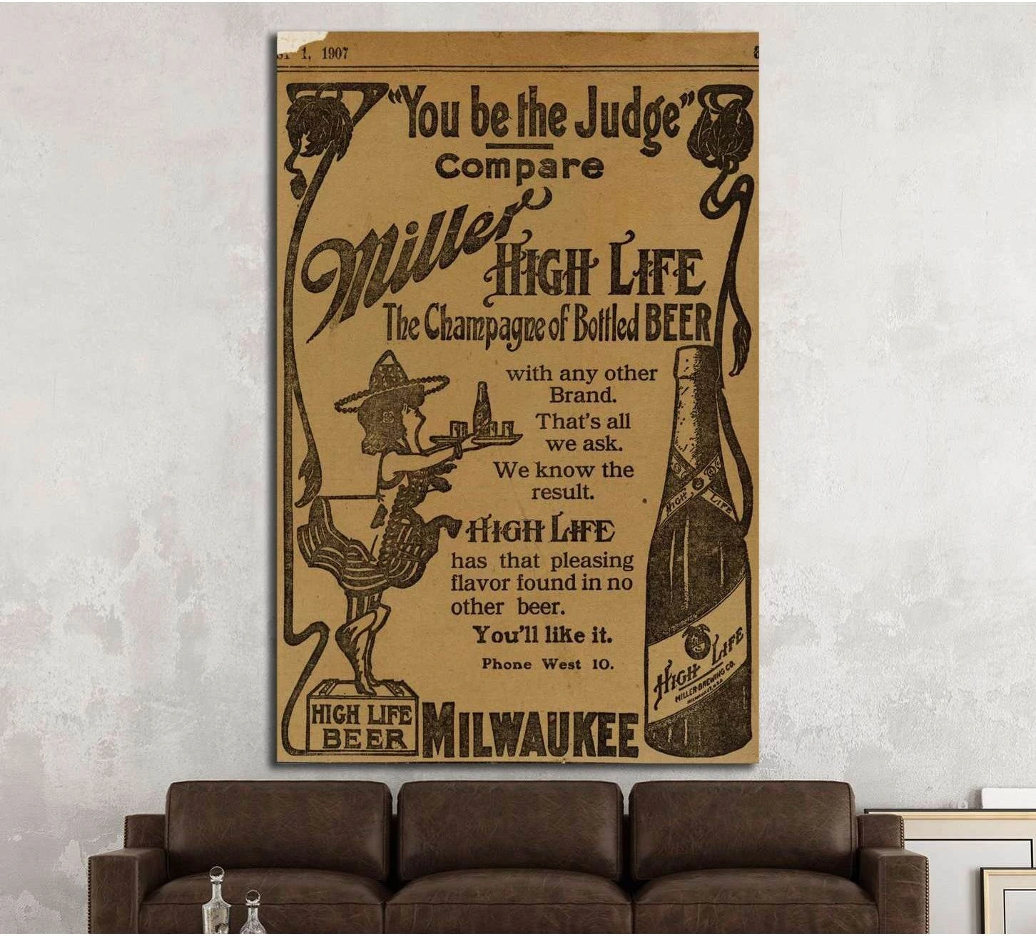 Vintage Miller High Life beer ad canvas print hung above sofa in a rustic bar-style living room