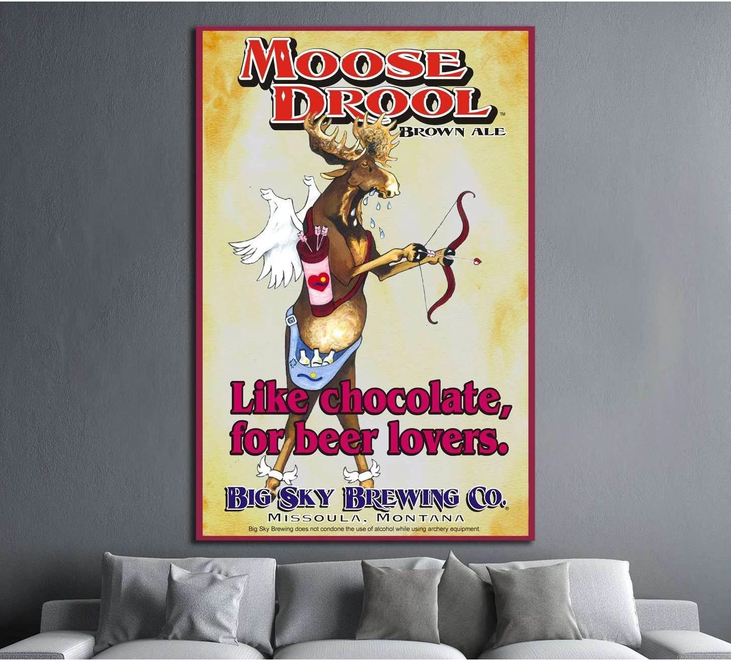 Moose Drool Brown Ale vintage beer poster canvas print above sofa in gray living room