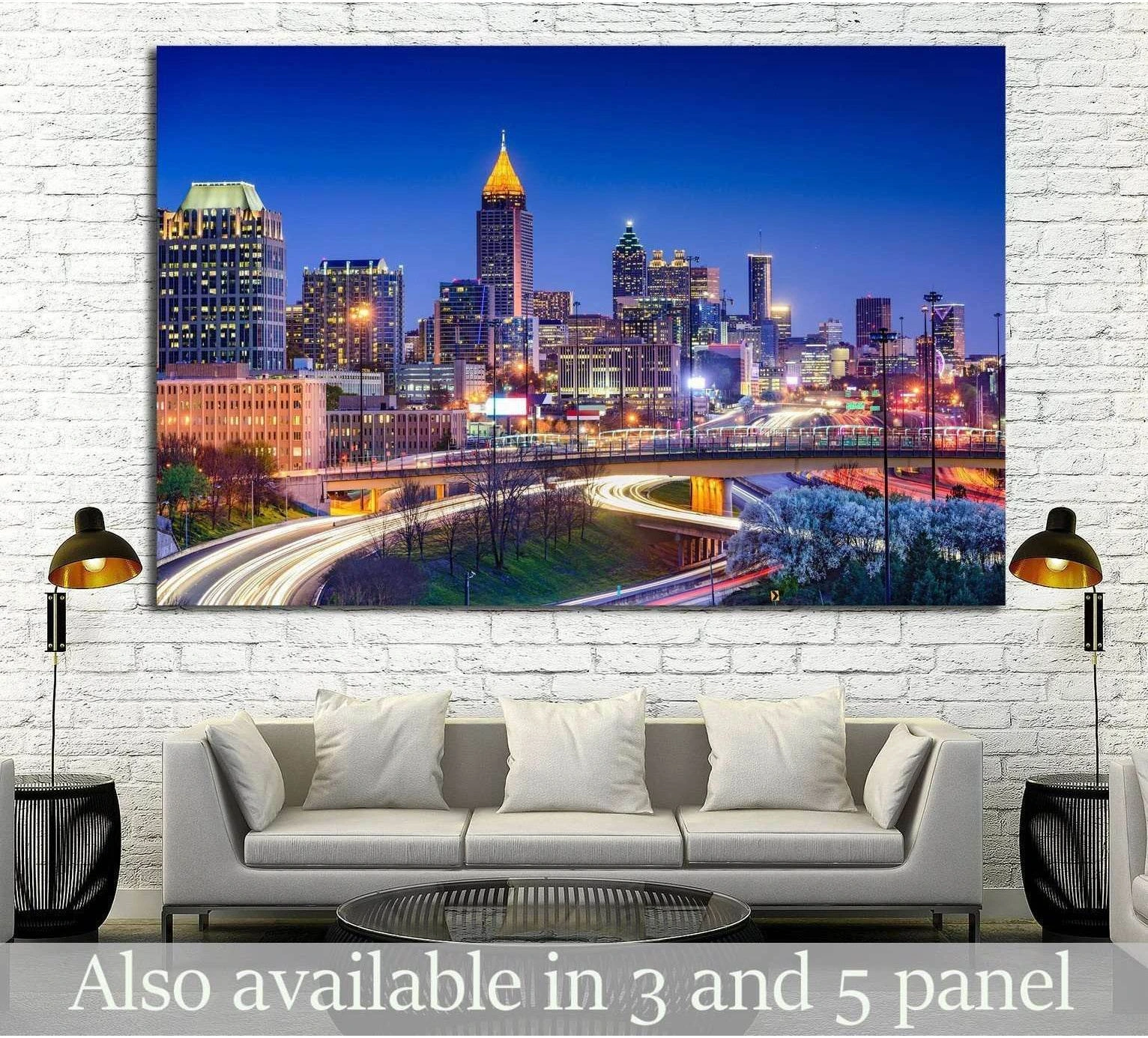 Atlanta skyline canvas print with night city lights above a sofa in a modern living room