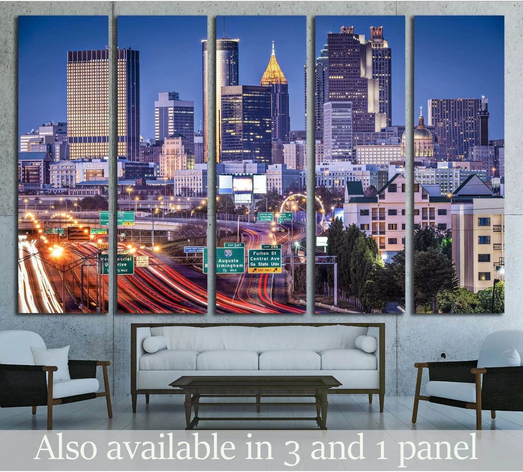 Atlanta skyline canvas print with twilight rush hour traffic above a sofa in a modern living room