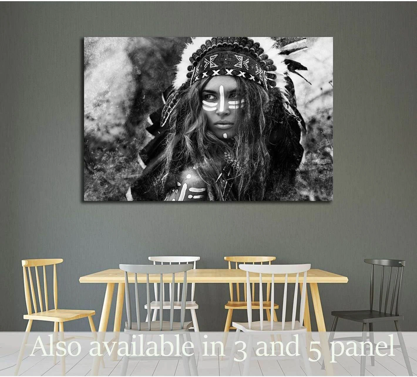 Black and white tribal portrait canvas print with feather headdress above dining table in modern room