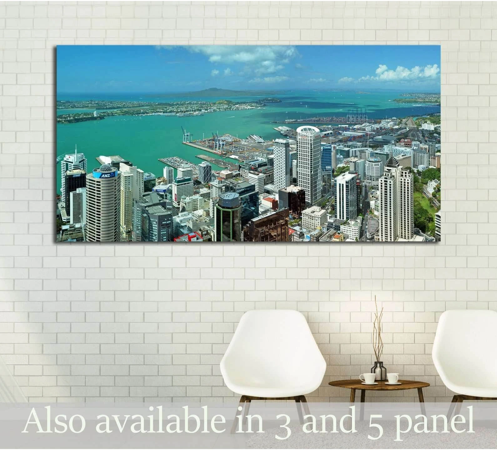 Auckland skyline canvas print with turquoise harbor and panoramic downtown view, displayed in a modern room