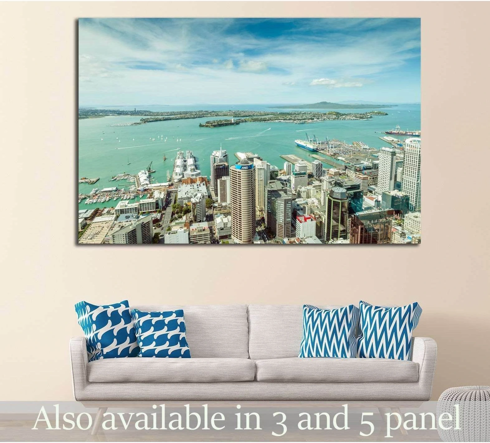 Auckland skyline and turquoise harbour canvas print hung above a sofa in a modern living room