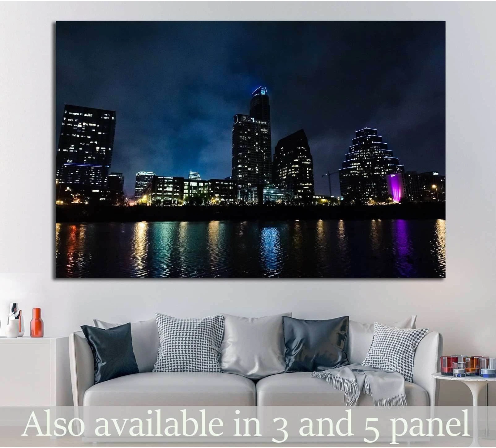 Austin skyline night canvas print above a sofa with blue and purple city lights reflected on the water