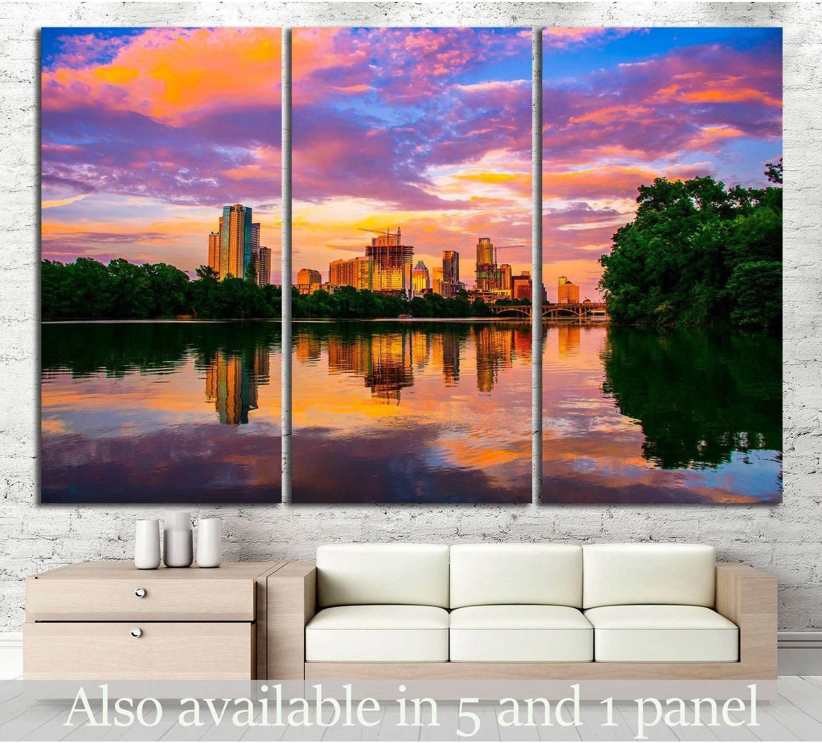 Austin skyline sunset canvas print above a sofa with pink and orange sky reflected on calm water