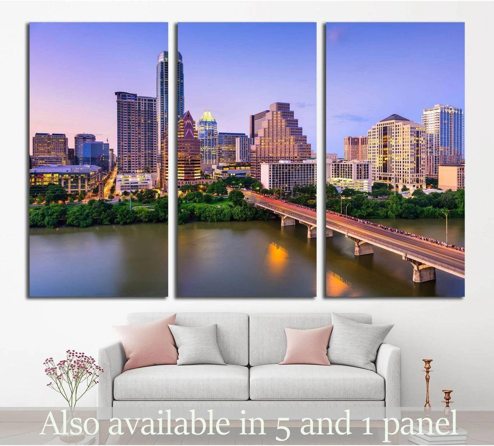 Austin skyline triptych canvas print above sofa with Colorado River bridge at twilight