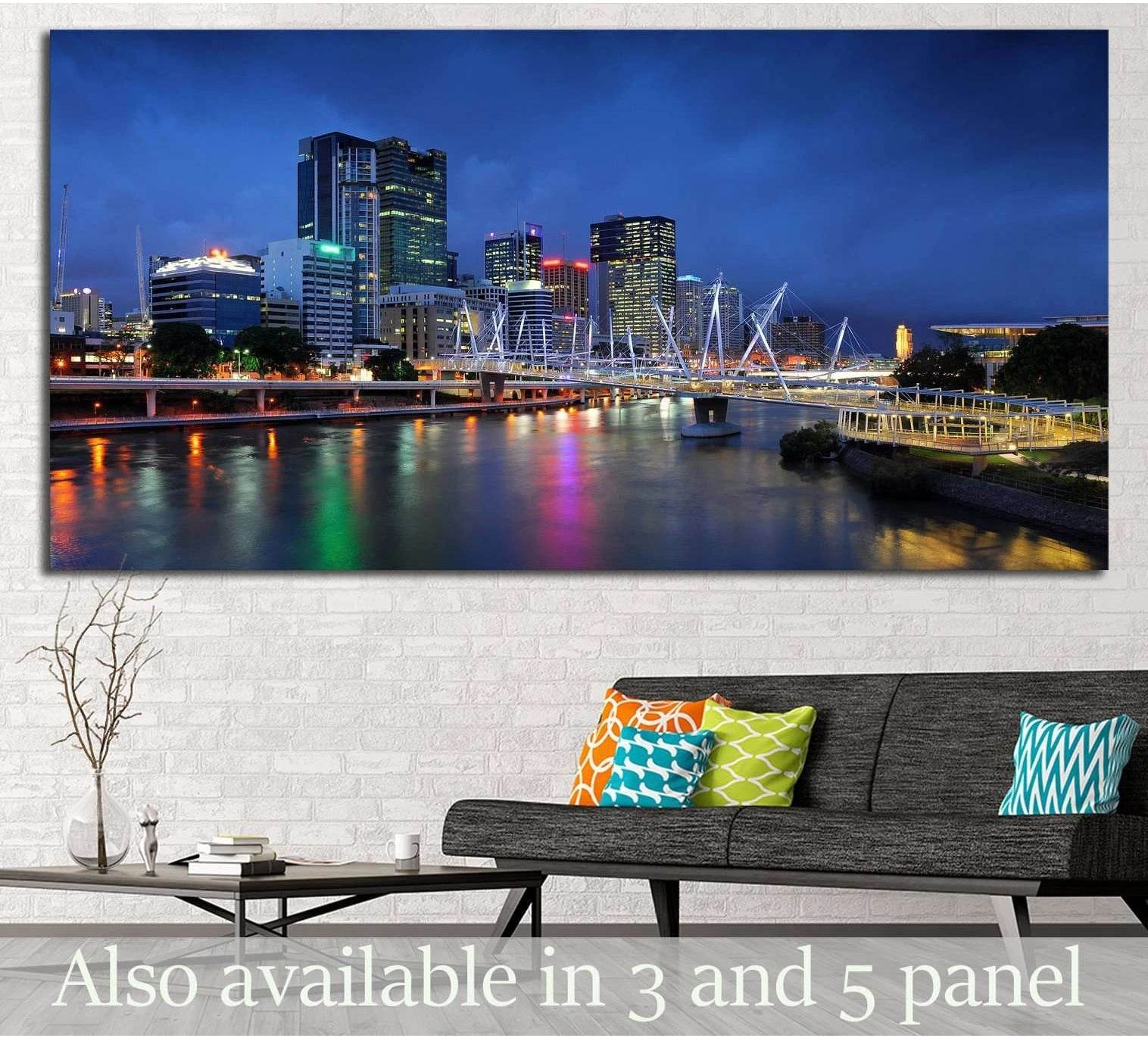 Brisbane Kurilpa Bridge canvas print with city lights and river reflections above a sofa in a modern living room