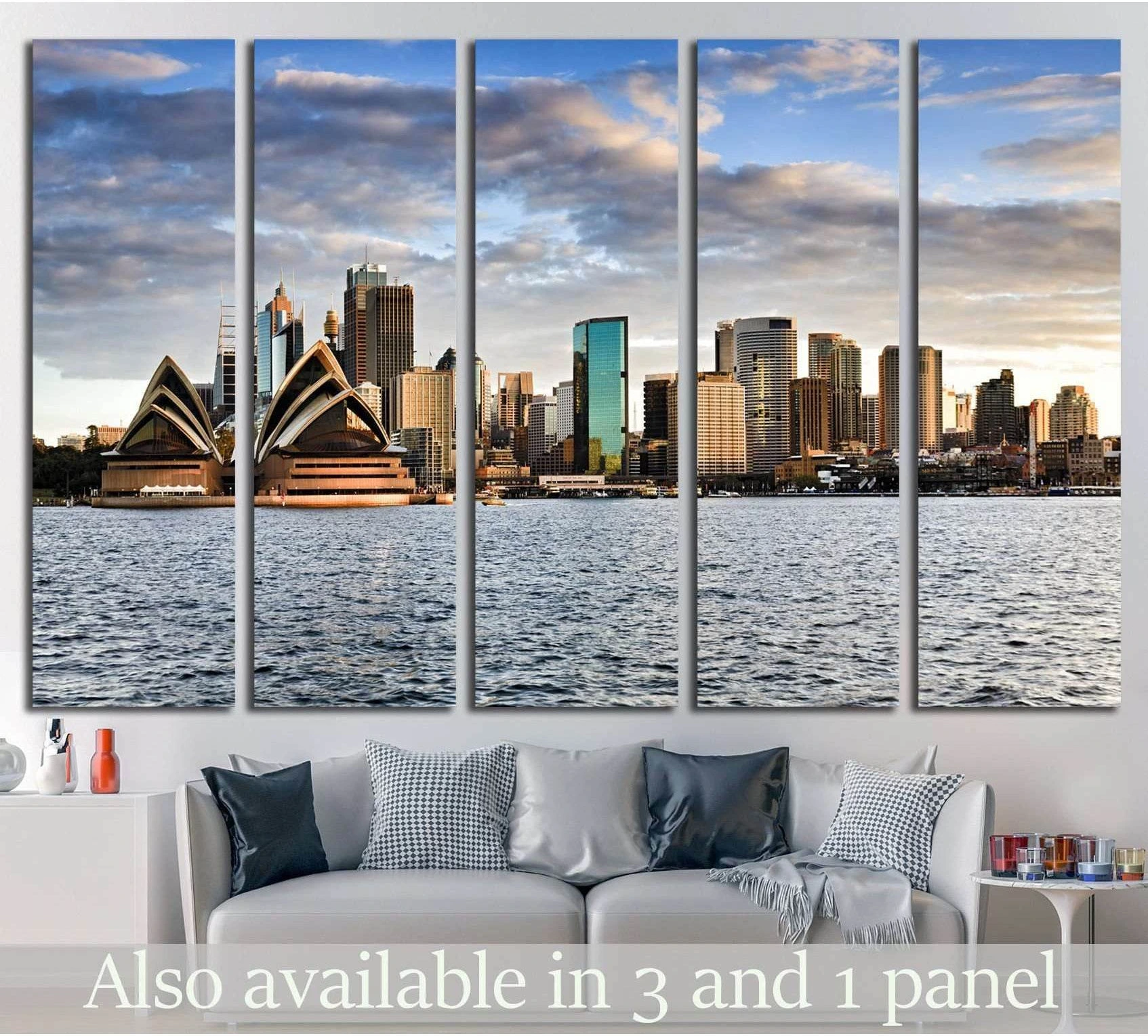 Sydney Opera House and skyline panoramic canvas print hung above a sofa in a modern living room