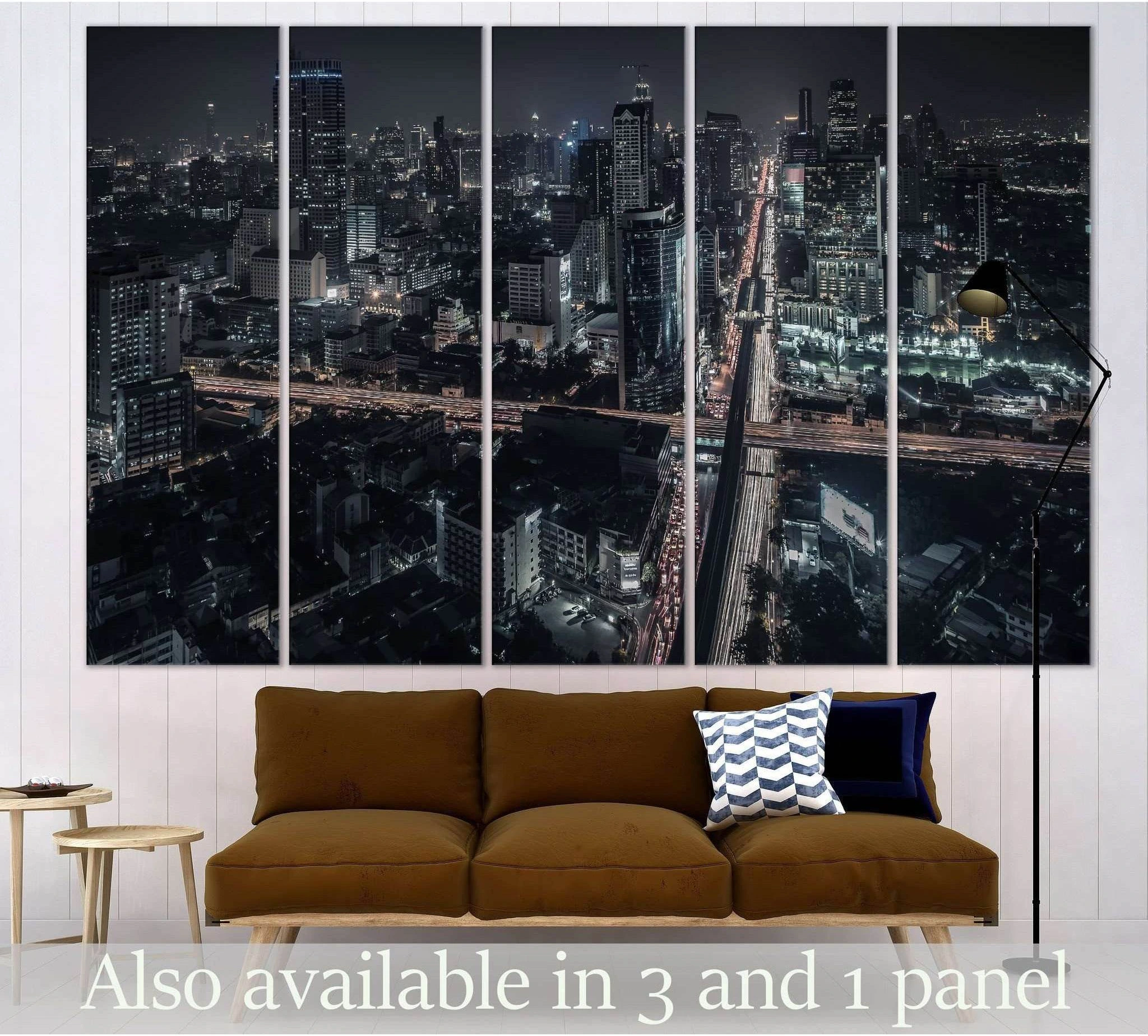 Bangkok skyline canvas print in five panels showing a monochrome aerial night city view above a sofa