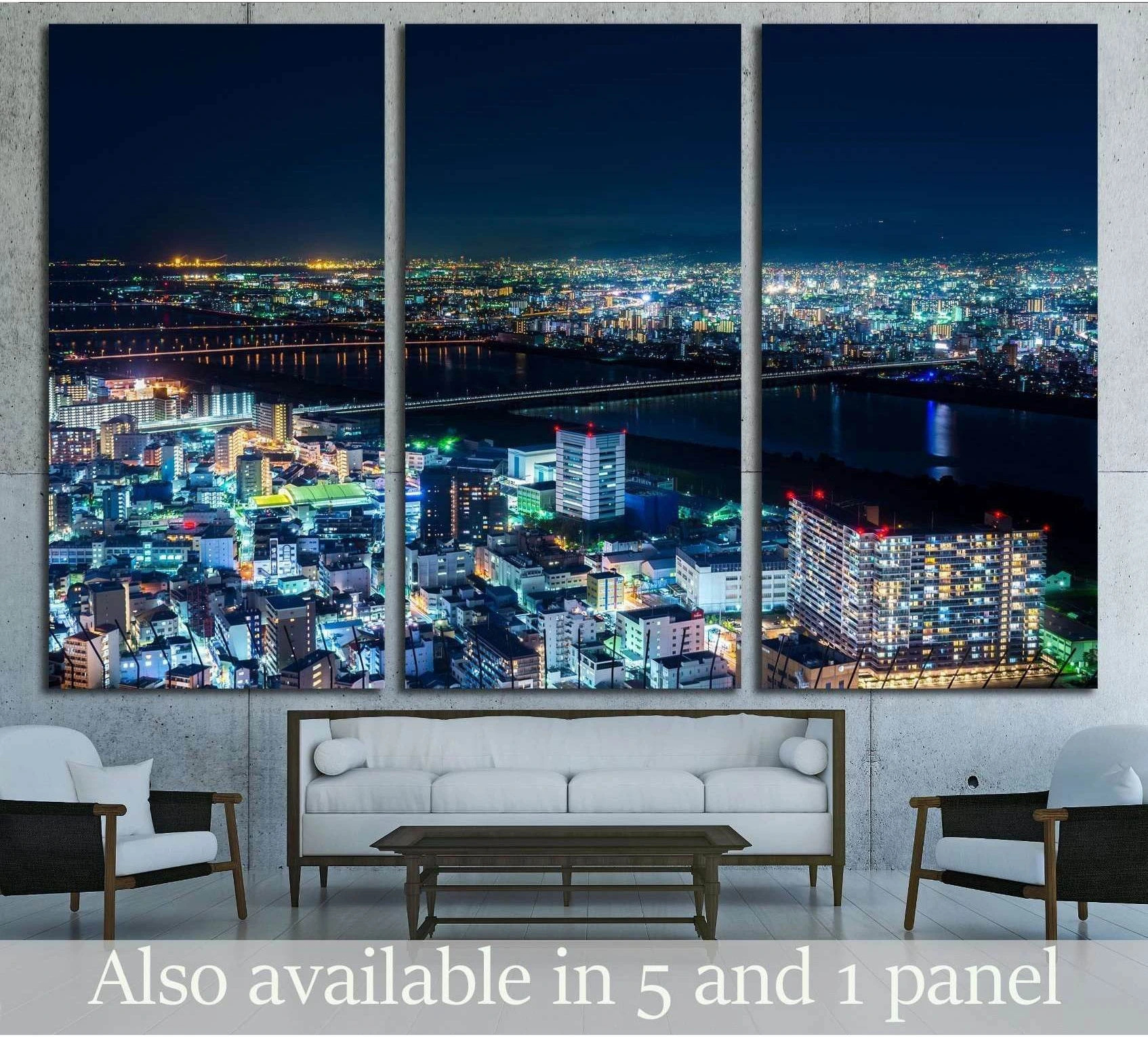 Osaka night cityscape canvas print in triptych layout above sofa with glowing skyline and river view