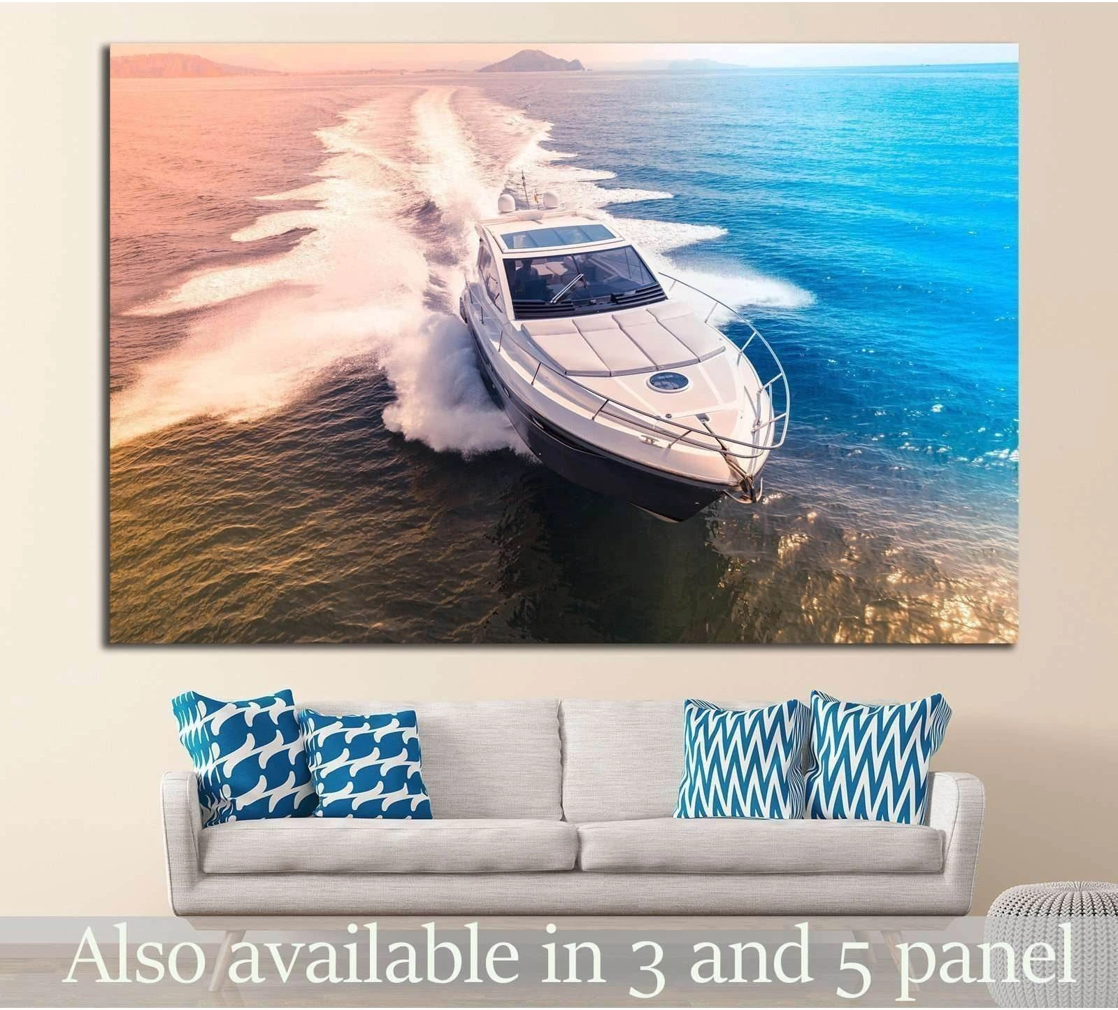 White motor yacht canvas print cutting through pink and turquoise ocean above a sofa